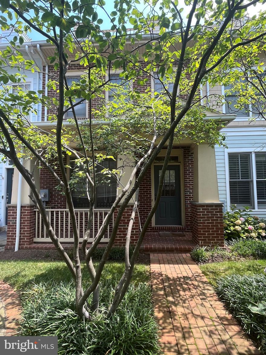 Gorgeous all brick 4-level townhouse in super convenient location! . Premium location, heart of Clarendon, 2 blocks to metro, restaurants & shops nearby. Chef kitchen w/ stainless appliance & double oven, master bath w/ oversized W/I shower. Hardwood floors for all 3 levels.  Walk in closets, fireplace, ceiling fan. 2-zoned HVAC, W/D on upper lvl, custom blinds, speaker system & 2-car garage. Outside perfect for entertaining; inviting front porch, large deck & balcony on the upper level. Fenced community. Arlington Science Focus elementary school.