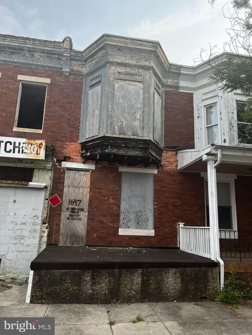 Investor special! This boarded-up single-family home offers a 1,260 sqft lot and endless potential for a full renovation. Built in 1940, the property features a brick exterior and a fireplace, but it requires a complete gut rehab.
Located in Baltimore, this is an ideal project for seasoned investors looking to bring this property back to life.
Sold as-is. Don’t miss this opportunity!