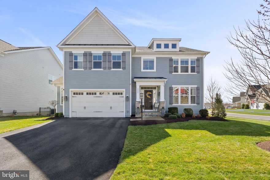 **Missed the twilight open house? Here’s your second chance! Join us Saturday, March 28th from 11–1 PM to experience this stunning home in daylight!**
Custom built by Lakeside Homes, this exceptional residence spares no attention to detail and showcases quality craftsmanship at every turn. From the fully cased Craftsman-style windows to the custom molding throughout and crown molding spanning all three finished levels, the architectural detail sets this home apart from the moment you enter.
Located in the highly sought-after Brookside community on the DC side of Warrenton, this five-year-young home blends timeless design with modern comfort in an amenity-rich setting surrounded by lakes and miles of scenic walking trails.
The light-filled main level features a stunning coffered ceiling in the living area, anchoring the space with warmth and elegance. The open-concept layout is ideal for both entertaining and everyday living. The gourmet kitchen showcases custom cabinetry, designer lighting, a wine/soda refrigerator, and high-end finishes, flowing seamlessly into the dining area and family room.
A dedicated main-level home office offers privacy and functionality — perfect for today’s lifestyle.
Upstairs, four generously sized bedrooms provide comfortable retreats, while the primary suite offers a spa-inspired bath and  two abundant closet spaces as well as a viewing deck to take in the lake sunrises & sunsets.
The expansive lower level adds incredible flexibility, including a fifth bedroom currently used as a home gym. This oversized space features its own private entrance, walk-in closet, and ample room to adapt for guests, multigenerational living, or additional recreation. An additional bonus room is perfectly suited for a theater room, recreation space, or playroom.
Step outside to a true backyard retreat. A massive custom Trex deck provides the perfect space for entertaining or relaxing, enhanced by a premium Sunbrella electronic retractable awning that offers adjustable shade and maximum comfort during the warmer months. Steps lead down to a professionally installed paver fire pit area, beautifully accented with mature trees and professionally installed landscape uplighting — creating an inviting setting to enjoy evenings under the stars.
The expansive backyard is fully fenced and pet-friendly, and is supported by a 7-zone underground irrigation system with a dedicated submeter, helping maintain lush, healthy landscaping while maximizing efficiency. The result is a beautifully manicured lawn that consistently stands out.
Additional upgrades include a whole-home water conditioning system, reverse osmosis water system, and numerous thoughtful improvements designed to enhance comfort and convenience. The two car garage is also oversized with an additional 6' extension.
Residents of Brookside enjoy exceptional community amenities including pools, tennis courts, clubhouse, playgrounds, and extensive trail systems — all just minutes from shopping, dining, and commuter routes.
A rare opportunity to own a nearly new custom home with extensive upgrades in one of Warrenton’s most desirable communities.