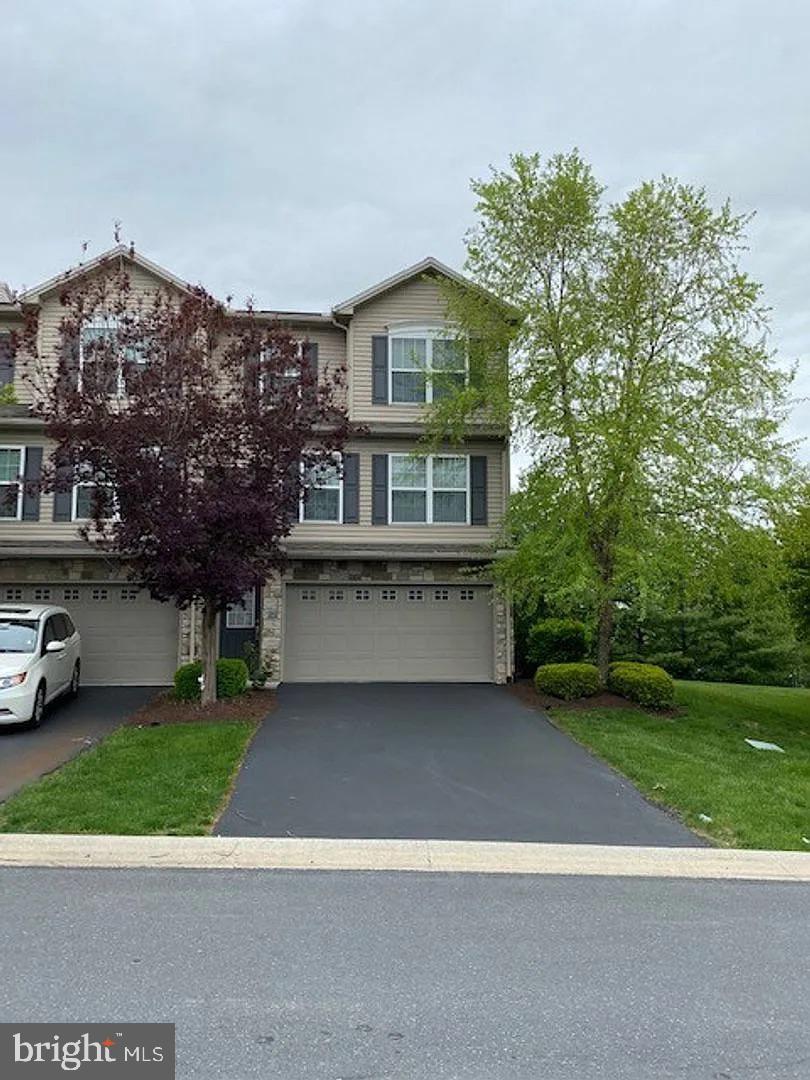 Gorgeous 3 Bedroom 2.5 Bathroom End Unit Town House backs up to trees for a private feel In Silver Creek Community, Cumberland Valley School District. This home boost bright & airy open Floor Plan w/neutral colors. Stunning upgraded kitchen w/dark wood cabinets, tile floor, center island & Stainless Steel appliances. Lg Deck off Dining rm backs to private back yard. Huge master suit w/W/I closet & full bath. 2nd flr laundry. Finished walk-out Lower Level for extra living space. 1.5 car garage w/storage area. Great Location. Walk to shopping Target, Kohls & Wegman's.