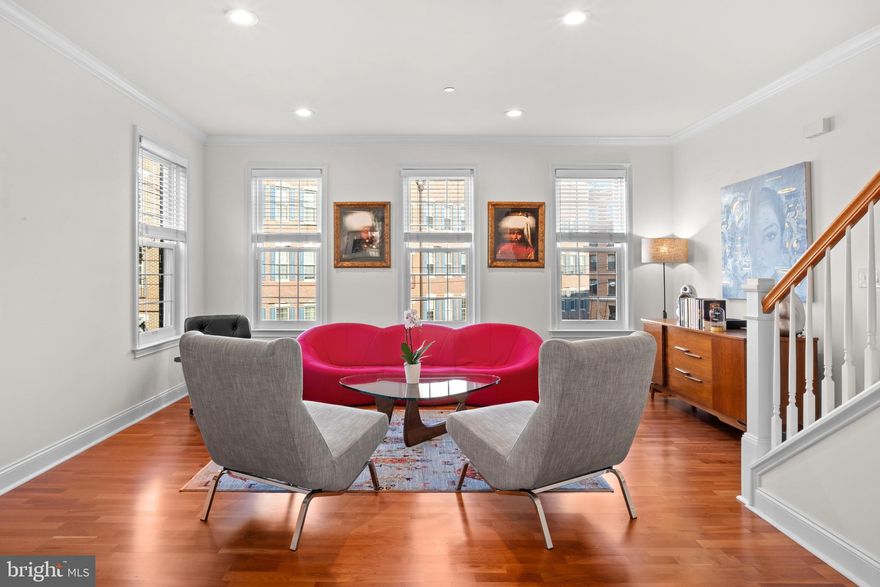 Discover the epitome of luxury living at 403 Governors Court, a remarkable townhome nestled in Philadelphia’s prestigious Naval Square community. This rare 4-story Dewey model—one of just 14 in the entire development—boasts a private entrance, a 2-car garage, and over $175,000 in upgrades! Designed with both style and function in mind, the expansive 18-foot-wide end-unit offers 3 bedrooms, all with en-suite bathrooms, plus a versatile den, a half bath, and two generously sized terraces.

Situated in the front of the community, down a beautifully landscaped pathway, you will find the pristine 403 Governors Court. Step inside, where a versatile space awaits—perfect for either a family room or home office. This first level also offers easy access to the 2-car garage, complete with ample built-in storage to keep everything neatly organized. You’ll also enjoy a convenient coat closet and an additional storage closet.

The second level is filled with natural light, featuring an open-concept living and dining area that flows seamlessly into a chef’s kitchen. The kitchen boasts professionally refinished, elegant white cabinetry with new hardware, Pietra Danae quartz countertops, a tumbled marble backsplash, and a Samsung stainless appliance suite. The eat-in-kitchen is full of sunshine, and opens to a serene terrace perfect for enjoying your morning coffee. Discrete powder room is just adjacent. Enjoy plenty of designer lighting upgrades on this level, including newly added under-cabinet lighting.

The third level is home to a luxurious primary suite, featuring dual walk-in closets and a fully renovated, spa-inspired bathroom. A stylish laundry area with barn doors and a new LG WashTower Stacked SMART Laundry Center (2021) is a welcome addition to the upper level of the home. This floor also includes a spacious second bedroom with its own newly renovated en-suite bath, offering both comfort and privacy.

The entire fourth floor is dedicated to a spacious third bedroom, featuring soaring vaulted ceilings, a private bath, and direct access to a stunning roof deck—perfect for relaxing and enjoying panoramic views!

No detail has been overlooked in this home, which features elegant Dove White paint & gorgeous cherry hardwood floors throughout.  Brand-new Renewal by Andersen doors and windows grace almost the entire property.

With a new hot water heater (2018) and two newer HVAC systems (2020 & 2024), all major systems are in excellent condition. Smart Home feature includes: Dual Ecobee thermostats, Ring alarm & doorbell & Schlage smart lock. 

Enjoy the ease of having a heated outdoor pool and a state-of-the-art fitness center just minutes from your home, with concierge services nearby. The dramatic community room in the Biddle Hall rotunda is perfect for reserving private parties. Enjoy the outdoor amenities of the 20-acre, park-like setting, including picnic areas, well-kept gardens, and mature landscaping. With a gated entry and on-site visitor parking, convenience and security are paramount. The property is also in very close proximity to the South Street Bridge, UPenn (0.7 mi), CHOP, HUP, Drexel, Rittenhouse (0.9 mi), and Fitler Square. Fantastic restaurants and cafes, such as Rival Bros Coffee, Friday Saturday Sunday (James Beard Winner), Illata BYOB, Pub & Kitchen, Southgate, Sabrina’s, and Loco Pez, are all just steps outside the gates. The new Heirloom Market by Giant and South Square Market are only a block away. Directly out the back gate, you will find easy access to Schuylkill River Park, including the award-winning trail and boardwalk, Markward Playground, tennis courts, and a dog park! Naval Square is a pet-friendly community, allowing up to 2 pets with no weight restrictions. Don’t miss this rare opportunity to own a piece of urban paradise in one of Philadelphia’s most sought-after neighborhoods!