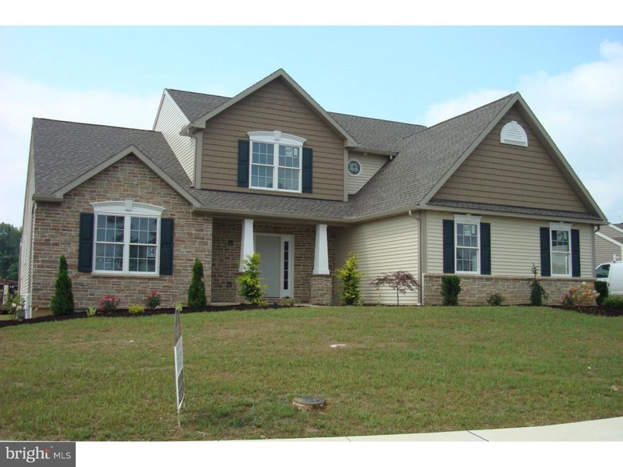 Quick Possession! Welcome to Green Valley West presented by Grande Construction, Builder of Fine Homes.   4BR 2.5BA, 2 car side-entry garage with arched frames, custom kitchen island with granite top, custom master shower, composite deck, stone fireplace with custom mantel and raised hearth, hardwood in dining room and living room, custom paint, tapered columns with stone, 5.25 baseboard on 1st floor and much more!   Call today and schedule a showing of this incredible Grande home.