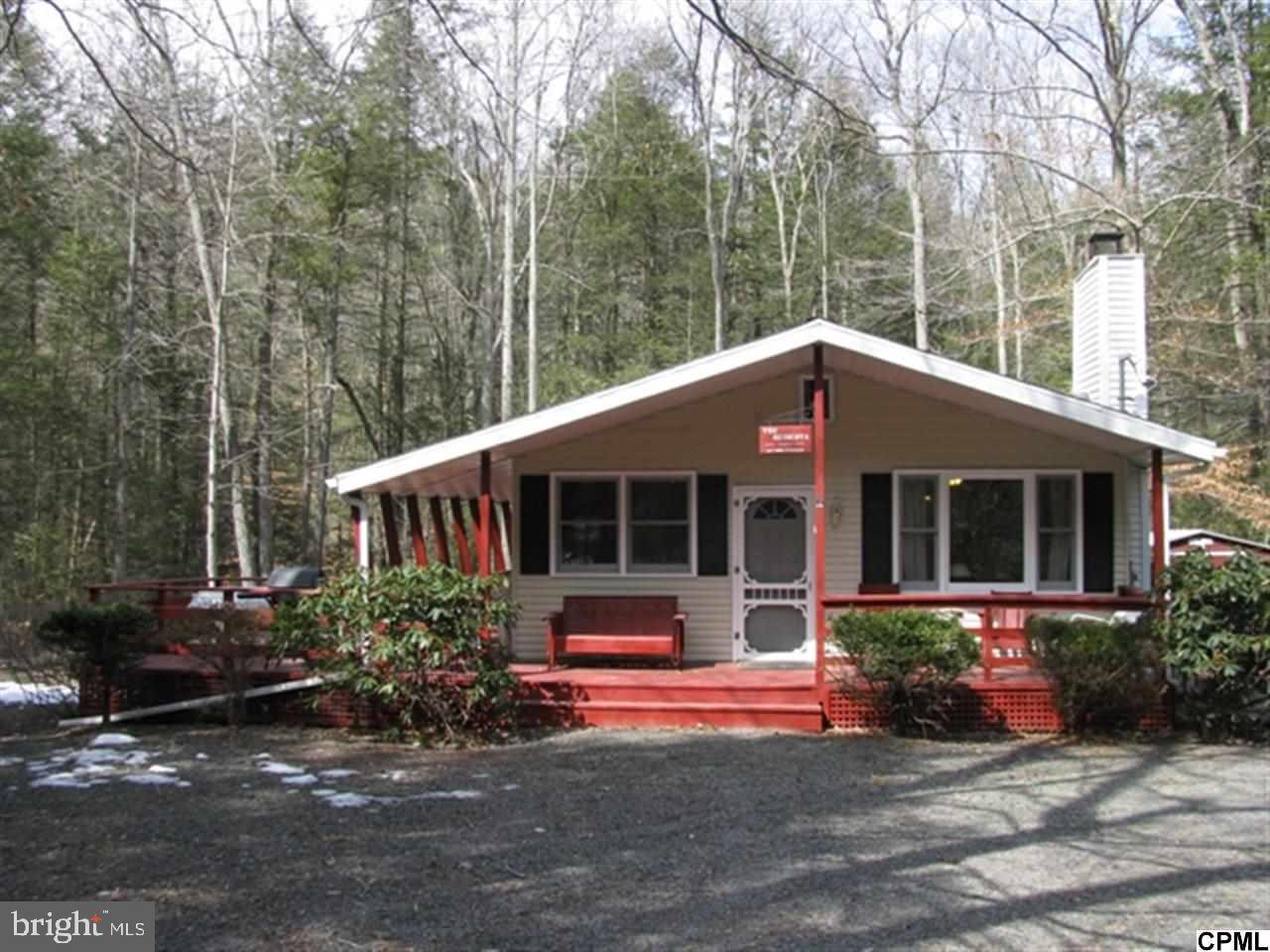 Looking for your own private getaway or perhaps permanent residency, then look no further. This maintenance free ranch style/cabin has been totally remodeled from top to bottom. Property sits on just over 1 acre, 2 bedrooms, living room, kitchen & lrg bathroom. Enjoy sitting on your deck, porch, around the campfire or going to the Heritage Hills Comm. Lake & lounge around, go swimming or just play. Close to state game lands.