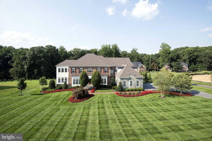 Stunning home is the vision of modern luxury living. Designer and artist inspired details throughout. Hand painted murals, detailed moldings, cherry floors, sisal wall coverings, tray & coffered ceilings, custom interior paints and fashionable lighting to name a few! nearly 10K sqft living space. Lavish MBD suite w/sittingRM and prvt sunRM. whole house surround sound & hardwired mediaRM. MUST SEE