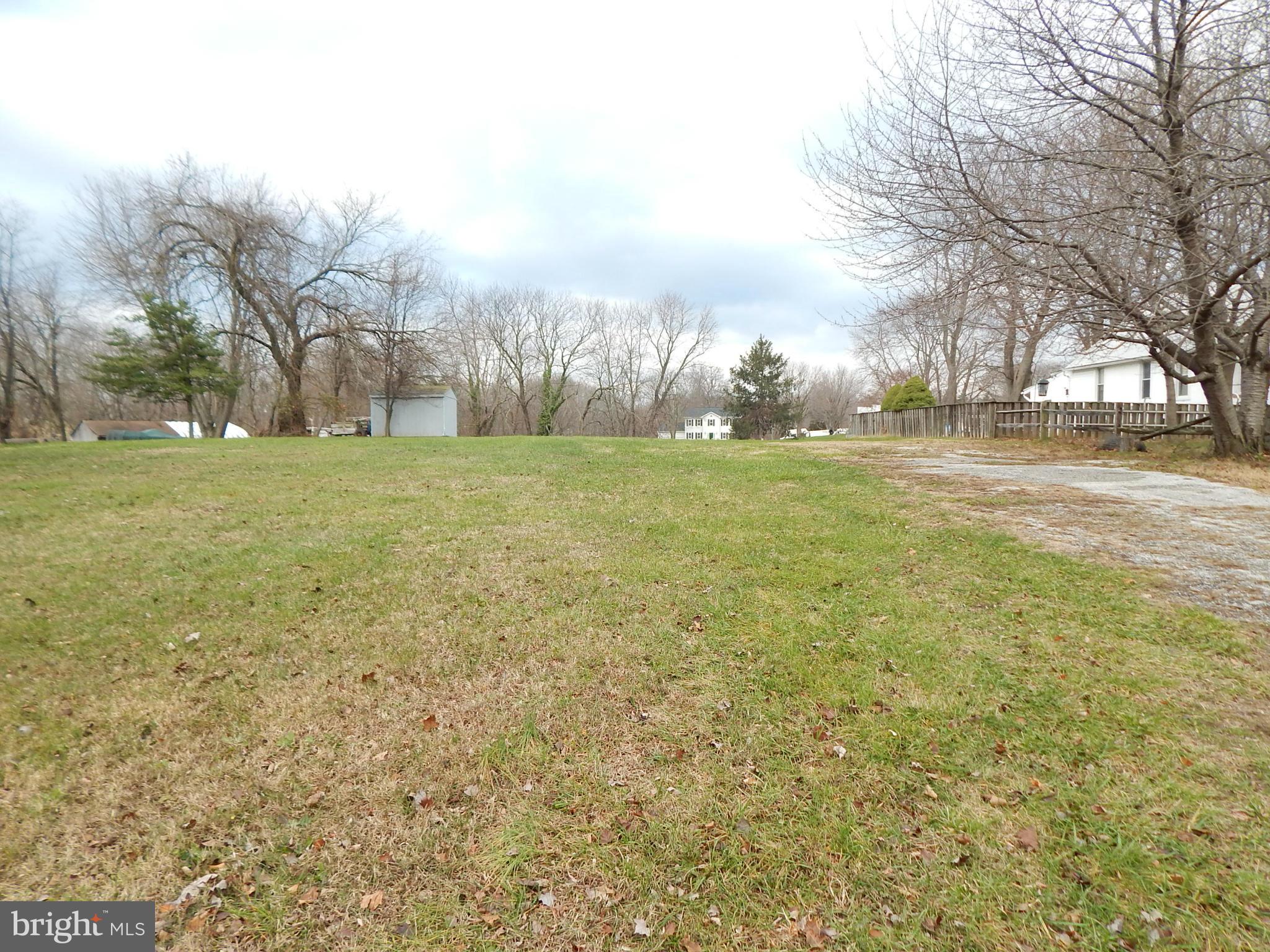 Desirable 1/3 Acre building lot. Public water and sewer available at street. Buyer responsible to obtain all permits for building. Convenient to shopping and major highways.
