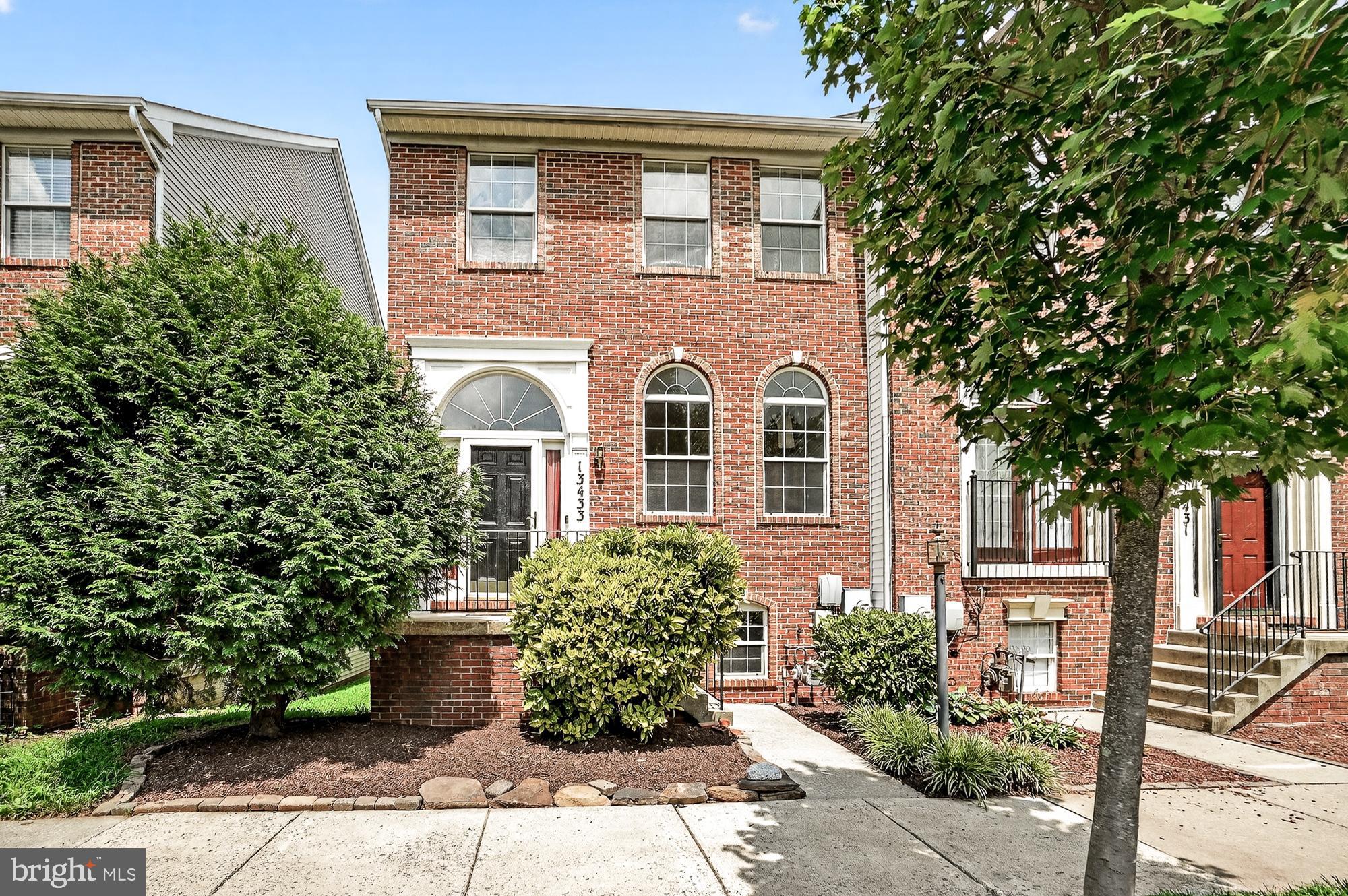 Fresh paint and new carpet make this end-unit townhouse move-in ready! Enjoy the privacy of a 2-car detached garage and a fully fenced backyard. The bright and open main level features hardwood floors, abundant windows, and a spacious kitchen with stainless steel appliances, ample cabinet and counter space, and a pantry. Upstairs, the generous primary suite offers a walk-in closet, private bath, and serene swimming pool views. Two additional bedrooms and a second full bath complete the upper level. The fully finished walk-out lower level includes a large family room with a gas fireplace, a potential 4th bedroom or home office, a third full bath, and plenty of storage. Major updates include a new roof (2020), water heater (2021), and a whole-house water filtration system with reverse osmosis (2025)—see documents for full list. Community amenities include a pool with kiddie pool, tennis and ball courts, tot lots, and ample guest parking. Ideally located near shopping, dining, entertainment, and major commuter routes—this home has it all!