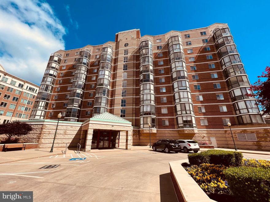 Large One bedroom plus Den condo unit on 3rd floor. End unit and face to south. Wood floor in living room and kitchen, carpet in bedroom. Beautiful balcony. W/D in unit. Elevator in building. Walking to Metro, shoping center and movie theater.  Building gate security. Assigned one car parking space in building. Vacant, Available right away.