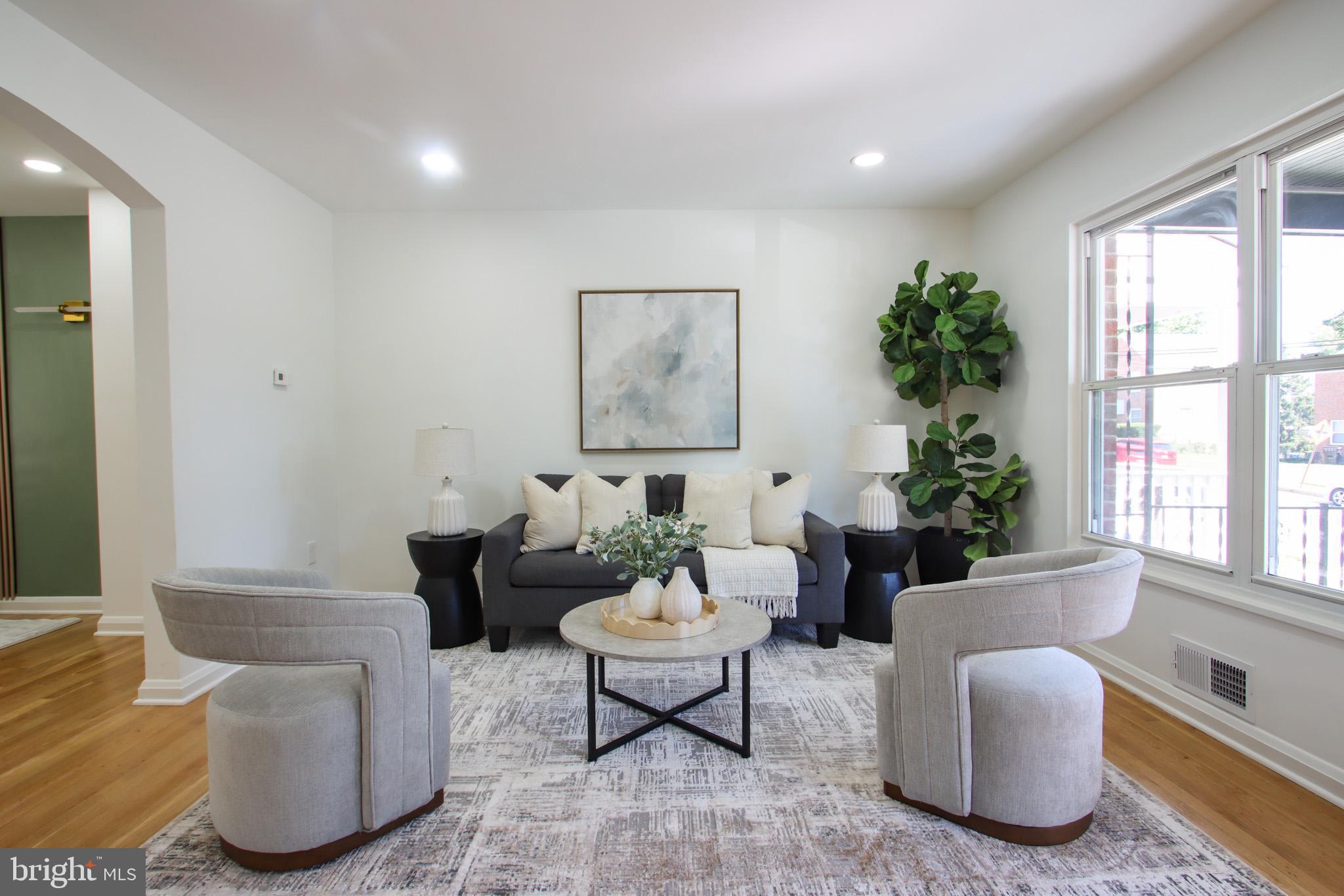 This beautifully renovated 4-bedroom, 2-bath townhome boasts a brand-new modern kitchen, stylishly updated bathrooms, gleaming new hardwood floors, and upgraded lighting throughout. Every detail has been thoughtfully upgraded – from fresh paint and contemporary fixtures to a fully finished lower level – making this home truly move-in ready. Nestled in a friendly neighborhood near local parks and trails like Gwynns Falls and Leakin Park, with shopping and dining just minutes away in nearby Catonsville, plus easy access to I-695 and I-95 for commuting convenience, this home perfectly blends modern comfort with neighborhood charm.