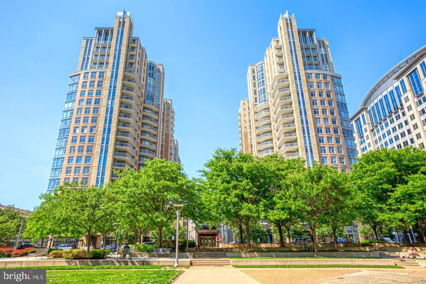 *** Open house this Sunday July 27th from 1:00 to 3:00 PM ** This stunning condominium is located in the East Building of Midtown at Reston Town Center and is in the heart of all the shops and restaurants that RTC has to offer. This 2-bedroom, 2-bathroom condo boasts modern décor including granite countertops, stainless steel appliances, and hardwood flooring throughout Living and Dinning areas, All freshly painted and all new carpeting in the Bedrooms. providing an elegant living space. Within the condo community, residents can enjoy the services of a 24 hour concierge and refrigerated storage for food deliveries, adding a touch of luxury to daily life. The outdoor pool provides a refreshing retreat during the warmer months, while outdoor gas grills on the second level terrace offer opportunities for alfresco dining and socializing. For entertainment, there's a private movie theater perfect for catching the latest releases without leaving the building. Additionally, living in Reston Town Center means residents have easy access to a vibrant dining scene, upscale shopping, movie theater, future home of City Swing, nearby metro stop, and recreational activities like ice skating in the winter and concerts in the summer. The den , dining room, or perhaps office space, located off the living room features large windows which offers an ideal spot for work or relaxation while enjoying views. The separate soaking tub and shower in the primary bathroom en suite adds a touch of luxury and convenience to the living experience. Living in this high-rise condo provides a blend of urban sophistication, convenience, and comfort, making it an ideal choice for those seeking a vibrant lifestyle in Reston. Situated across from the Reston Town Park, this sophisticated unit with stunning views from every room Two deeded parking spaces next to each other just across from the garage elevator are included in this offering. Midtown at Reston Town Center has a gorgeous lobby with a cozy fireplace and sitting area, a well-equipped gym, an outdoor pool and 24/7 concierge services. Enjoy the finest of penthouse living with all the offerings of Reston Town Center. Restaurants, shops, Metro and access to the W&OD Trail are just outside your front door. Dulles Airport is less than 4 mi away and 20 mi from our nation's capital.