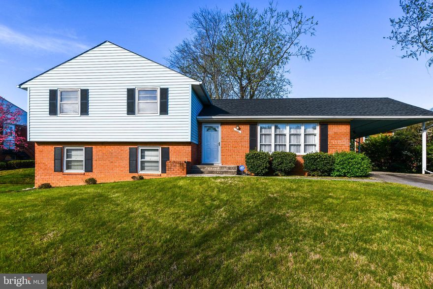 Spacious light filled 4 level home.  Features include 4 bedrooms, 2 and 1/2 bathrooms, formal living and dining rooms, eat in kitchen with lots of cupboards and counter space and room for a table, primary bedroom suite with walk-in closet and a bonus closet.  There is a family room with fireplace that is walk out level to a rear patio and a recreation room with a bar on the lower level. Roof is approximately 2 years old.  Security system. Offers due Monday at 4pm