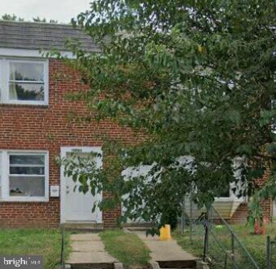 Location!  End Unit 3 bedrooms 2 full bath brick row house.  Needs full remodeled.