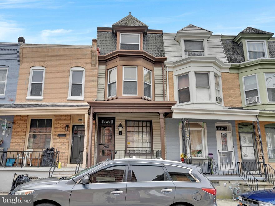 Investor Special or First-Time Buyer Alert!
This spacious 3-story row home is perfect for an investor looking for their next project or rental property, or a first-time buyer ready to build equity. With 3 bedrooms plus a walk-through 4th bedroom on the third floor, there’s plenty of space to grow or work from home.
Step onto the charming front porch, a perfect spot to enjoy your morning coffee or unwind at the end of the day. Inside, the main floor features a large living room, great for relaxing or entertaining.
The second floor offers two well-sized bedrooms and a full bathroom, while the third floor includes a private bedroom and a walk-through fourth bedroom, ideal for an office, playroom, or creative space.
The basement includes a second full bathroom and provides plenty of storage.
Major updates include a roof (2007), electric water heater (2018), and natural gas furnace (2012), giving you a solid foundation to work from.
Whether you're looking for a value-add investment or a home to make your own, this one has the potential you're looking for. Schedule your showing today!