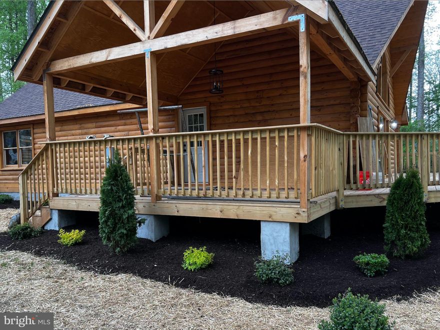 This gorgeous log cabin is located on the private side of Lake Anna in Brandywood Estate. This is brand-new construction. The home has hand-crafted carpentry details adding one-of-a-kind character to the home. This property also comes with a boat slip at the common area (#22).