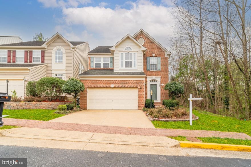 Look no further, this exquisite 5-bedroom, 3.5-bath, three-level single-family residence is a true gem given its private end unit position, complete with a spacious 2-car front-load garage and deck. As you enter, you are greeted by an elegant 2-story foyer and gleaming hardwood floors throughout both the main and upper levels. This home has been lovingly taken care of by the original owners and some of the latest updates are: 

*Deck flooring (2024) 
*Power washed and painted whole exterior (2024)
*Installed gutter guards (2024)
*HVAC (2023) 
*Kitchen Refrigerator (2022)
*Washing machine (2024)
*Dryer (2020)
*Water heater (2016).
 
The eat-in kitchen boasts Corian countertops, 42-inch custom cabinetry, recessed lighting, a center island, and abundant storage space, including a pantry. The family room is in clear sight with a cozy gas-burning fireplace and access to the updated deck, offering tons of natural light. It's all a great setup for relaxation and entertainment. The main level also comprises of a powder room, the formal dining room, and the 5th bedroom currently set up as the study with custom-made bookshelves.

The second floor comprises of the master suite with two walk-in closets and the ensuite master bath featuring tile flooring, double vanity, a soaking tub, and a separate shower stall. The second floor also includes three other generously sized bedrooms, each with solid hardwood flooring, and a guest bathroom featuring a tub/shower combo. For added convenience, the laundry room is located on the same floor, making laundry exceptionally easy. 

The fully finished lower level expands the living space by approximately 1,200 square feet, offering versatility and functionality. It features a dedicated gym, built in bookshelves, and a minibar area that can easily be transformed into a kitchenette. The expansive recreation room with engineered wood flooring, provides endless entertainment possibilities. A spacious storage/utility closet adds convenience, while a full bathroom with a tub/shower combo completes the space. The extra fridge, cabinets and shelving in the 2-car garage convey. The driveway has space for an additional two cars. 

This home is in the sought-after Lorton Station Community where residents have access to two pools, numerous trails/paths, basketball courts, tot lots, and community events. Location, location, location! This home is situated just minutes from three shopping centers offering everything you need.  Walk to the Lorton Virginia Railway Express (VRE) Station.  Bus it to the Franconia-Springfield METRO Station on the blue line. This is the perfect location conveniently located right off I-95 near Ft. Belvoir, NGA, Burke Lake Park, Laurel Hill Golf Course, Occoquan Historic District, Lorton Marketplace, Liberty Market, schools, restaurants, and museums.