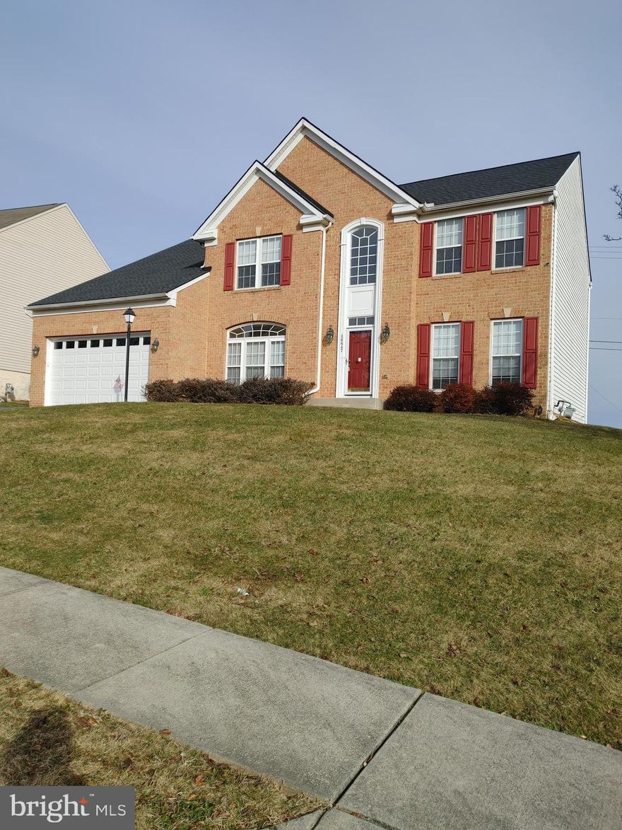 Brick front colonial in  Westfield Estates is a prime location,  minutes from I-83, conveniently located to shopping, restaurants, and other stores.  NEW ROOF (11/2021) 50 Year Warranty, NEW RADON SYSTEM (11/2021),  NEW GARBAGE DISPOSAL (12/2021), and NEW SCREEN FRONT DOOR (12/2021).  Two story foyer with a balcony overlook, 1st floor Office off of foyer,  1st floor Laundry Room,  Living Room,  Dining Room , 1/2 bath,   spacious Kitchen  with center island  open to a  spacious Family Room.   Two Car Garage (entry door through laundry room).  Second floor has  large primary suite with walk-in closet and ensuite bath,  3 more bed rooms, and hall bathroom.  Full  Basement which is mostly finished and lots of storage rooms .  Large Deck out back that steps down to a patio.  Also includes a HOME WARRANTY.