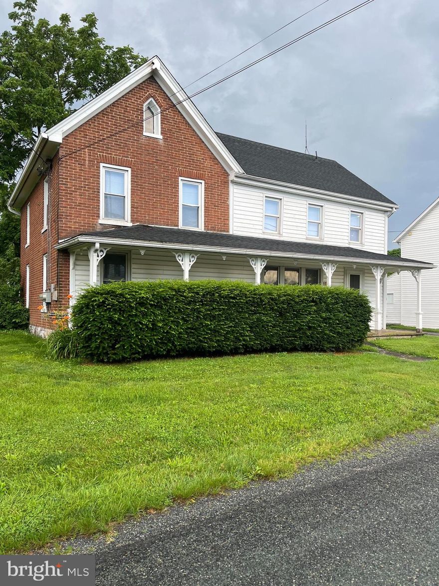 This charming one-bedroom apartment is located on the second floor and offers a comfortable and convenient layout. The bright and spacious living room features brand new vinyl flooring and plenty of natural light. The eat-in kitchen is equipped with a stove and refrigerator, providing all the essentials for easy meal prep.  The bedroom includes a generous walk-in closet with in-unit laundry for added convenience. The full bathroom features a tub/shower combo.  The hallway has a small nook, perfect for a desk! This unit has been freshly painted and has new flooring throughout. A small garage, for additional storage and off-street parking are included along with water/sewer and lawn care. Looking for a rural area, but still wanting to be close to interstate 81? This is the perfect location! This is a no pet and no smoking property. Landlords are seeking tenants with very good credit and stable, steady employment. All potential tenants will be screened prior to showings. Room sizes and sq footage are estimated.