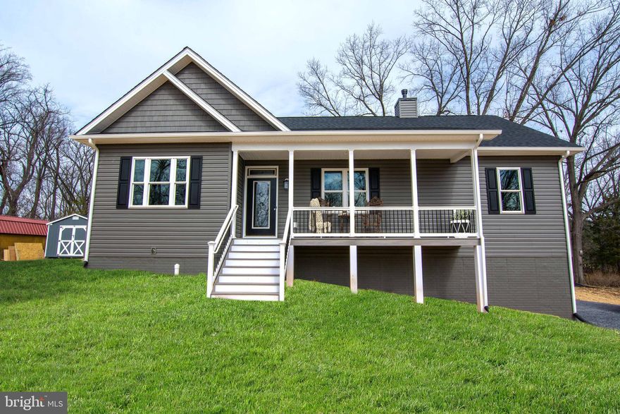 Build time approximately 6 months — customize this home with all the upgrades, bells, and whistles! Enjoy vaulted ceilings, luxury vinyl plank flooring, and an open floor plan featuring a spacious great room flowing seamlessly into the kitchen — perfect for entertaining.

The kitchen offers granite countertops and stainless steel appliances. The primary suite features a luxury tiled shower and a walk-in closet. A full basement with abundant natural light provides endless possibilities to finish and nearly double your living space. Complete with a 2-car garage, full-length front porch, and rear deck overlooking a large one acre lot.

Located with easy access to I-66, this home is ideal for commuters and those working from home with high-speed internet available. Enjoy lake access and community common areas, plus proximity to hiking, wineries, and the town of Front Royal.

Local builder is flexible and easy to work with — select your colors and finishes to make it your own.

10K non-refundable deposit required. All upgrades must be paid up front to the seller and are non-refundable.

One-level living at its best — with room to grow!