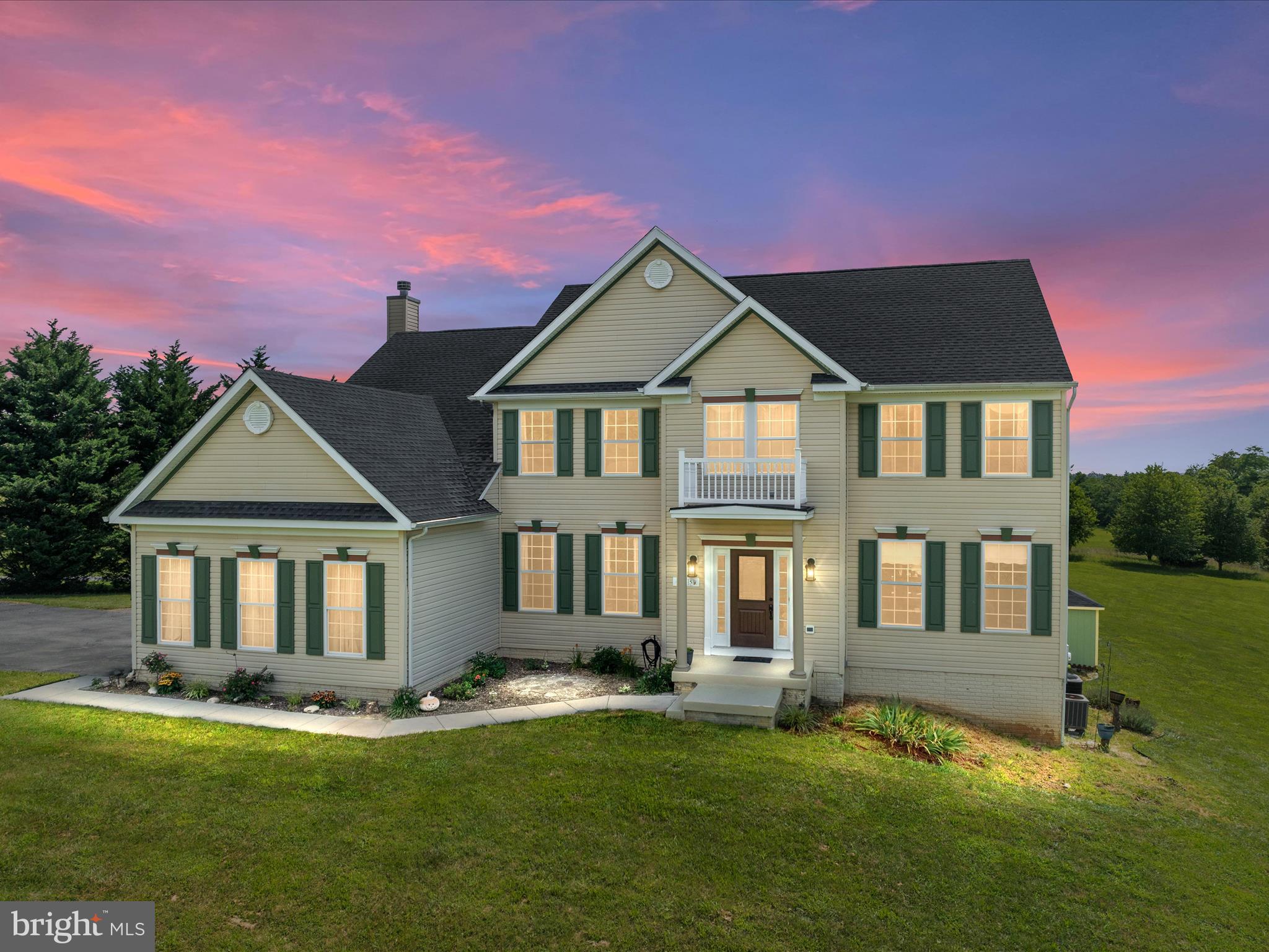 Stunning Colonial home in Waverly View Subdivision boasting over 4300 square feet of living space across 3 stories. This 5-bedroom, 4.5-bath home sits on 1.67 acres and features a fully finished basement, an oversized 2-car garage, and plenty of parking in the expansive driveway. Enjoy a thoughtfully designed layout with a sunroom off the breakfast area, formal dining room and library divided by elegant columns, and a cozy living room with a wood-burning fireplace. The gourmet kitchen is a standout with granite countertops, tile backsplash, center island with cooktop and cabinetry, stainless steel appliances, double oven, white cabinets with black hardware, and a generous coffee bar area. The primary suite is oversized with a sitting area, large walk-in closet, and a luxurious bathroom featuring a soaking tub and walk-in shower. Upstairs also includes a bedroom with its own attached bathroom and a Jack-and-Jill bathroom connecting two other bedrooms, while the finished basement offers a fifth bedroom with walk-in closet, huge rec room, bonus room, full bath, and utility/storage area. Outdoor living is just as impressive with a deck, stamped concrete patio, gazebo, and mountain views. Additional highlights include two sheds (one with power), two water heaters, 4-zone heating and cooling (one per level plus the garage, which is also heated and cooled), and a conventional septic system. So much space, inside and out – truly a home that has it all! BONUS - the sellers are putting in vinyl plank flooring throughout the whole upstairs!