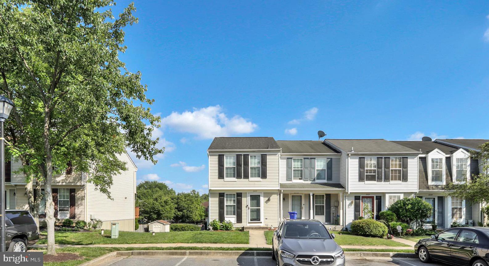 Adorable end-unit townhome in Parkview Trails! This delightful home offers a convenient front kitchen with new stove and new refrigerator with ice maker and water filter. Living room with sliding glass door to entertain family on sized deck. Fully finished lower level with full bath; laundry room & walk out to the over sized back yard with a storage shed; The upper level has two large bedrooms and a full bathroom with separate vanities. Carpet and Laminate Floors throughout the home. BRAND NEW A/C UNIT INSTALLED 06/2022 with wireless/wifi control; Washer & Dryer; 2 assigned parking spots; Community amenities such as an outdoor pool & clubhouse. Just minutes away from Patapsco State Park, restaurants, shopping & easy access to commuter routes(I-70, 695, 40 & 29).