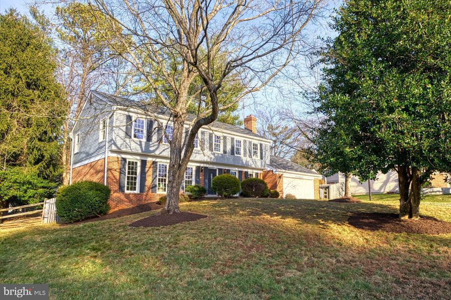 Generously-sized colonial home on cul de sac has perfect flow for living and entertaining.  Large windows flood the main level with natural light, highlighting the fresh paint and hardwood floors throughout. Sunny eat-in kitchen has plenty of cabinet and pantry storage and a gas stove for chefs. With five spacious bedrooms  upstairs, everyone sleeps safely on one level. One bedroom is attached to the primary suite, great for a nursery or home office. Hardwood floors continue upstairs. The lower level is finished with a huge rec room, two storage rooms and a full bath. Maybe achieve your new year's resolution with new home gym space?  Lot is just over a quarter-acre and has mature trees, a fenced backyard and a brick patio, perfect for barbecues or sports practice. Attached garage provides room for cars and additional storage. Beautiful parks in the neighborhood, easy access to 270 and Rockville.