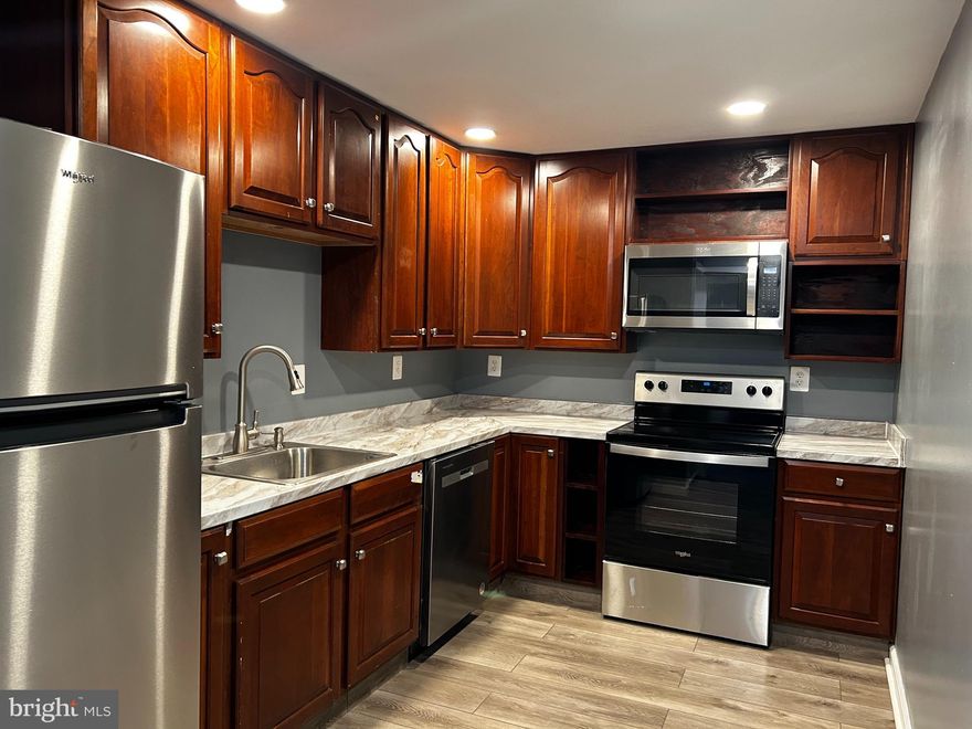 Basement Apartment! ALL UTILITIES ARE INCLUDED. This fully finished basement apartment unit offers a seamless blend of comfort and style, providing an exceptional living experience. As you step into this thoughtfully designed space, you'll immediately be captivated by the contemporary aesthetic and high-end finishes throughout.

The living area boasts a cozy ambiance with an electric fireplace, creating a warm and inviting atmosphere perfect for relaxation and entertaining. The sleek stainless steel appliances in the well-appointed kitchen not only elevate the overall aesthetic but also offer a premium culinary experience for residents. Whether you're cooking a gourmet meal or enjoying a quick snack, the kitchen is a culinary haven.

The private entrance ensures a sense of exclusivity, providing residents with the freedom and privacy they desire. As you enter the apartment, you'll be greeted by an open and spacious floor plan that maximizes every inch of the living space. The well-lit rooms and carefully chosen color palette contribute to an airy and bright atmosphere.

Step outside, and you'll discover an added bonus – access to a community pool. Imagine lazy summer afternoons spent lounging by the pool, enjoying a refreshing swim, and creating lasting memories with neighbors and friends. The community pool becomes a retreat just steps away from your private sanctuary, offering a perfect escape on warm days.

With its upscale features, attention to detail, and access to community amenities, this property redefines the concept of a basement apartment, providing a living space that meets the highest standards of comfort and sophistication. Welcome home to a haven where luxury and convenience converge.