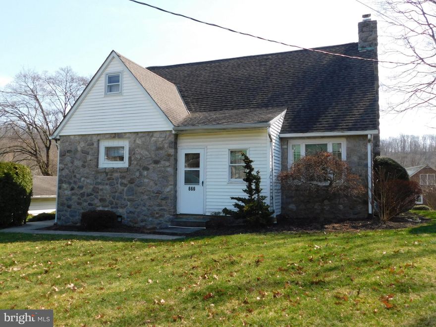 Stone Cape Cod in BASD, Located along Rt 562/S. Reading Avenue in Boyertown, this 3 BR, 1/5 BA has plenty to offer. Owner of 45 years says it is time to move on. Notice the two and a half car garage as you pull in the wide driveway. there is plenty of room for 2 vehicles and storage for your outdoor equipment as well as driveway space for 4 cars. The lot is approximately 1/3 acre with a beautiful backyard. up the outside stairs to the side entry of the house, you will first enter the kitchen. On this main level, you have the primary bedroom with a full hall bath. In the large living room is a beautiful stone-surround propane fireplace. Going to the back of the house you will come to the dining room. Many years ago this was an add-on to the house as you can tell by the original stone wall accent. Pass through the sliding glass doors to the enclosed sunroom leading to the backyard. At the very front of the house, the original porch has been enclosed and it is used as a utility/storage room. Upstairs are two secondary bedrooms and a half bath. The attic can be accessed through the smaller bedroom. There is also a small open area which could be used as a craft room or book nook. The basement is partially finished with a living area and access to the backyard, laundry facilities and a workbench. Public water and sewer.