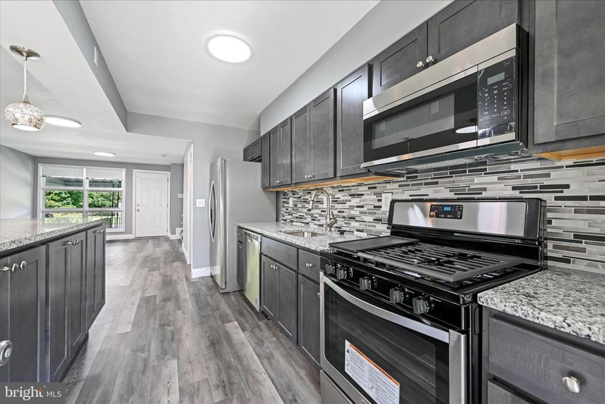 Welcome home to this gorgeous renovated home in Dundalk.  You'll be worry free in this move-in ready home featuring 3 bedrooms, 2 full baths, and the space you desire inside and out.  Enjoy the latest style with fresh paint, new lighting, and luxury vinyl tile throughout. The kitchen features new stainless steel appliances, modern cabinets, and granite countertops.  The front offers a covered porch - a great spot to relax in the evening or to enjoy your morning coffee.  And let's remember  Fido - he will love romping and enjoying his best life in his new fenced back yard.  Welcome to 1434 Dundalk - you're going to love life here!