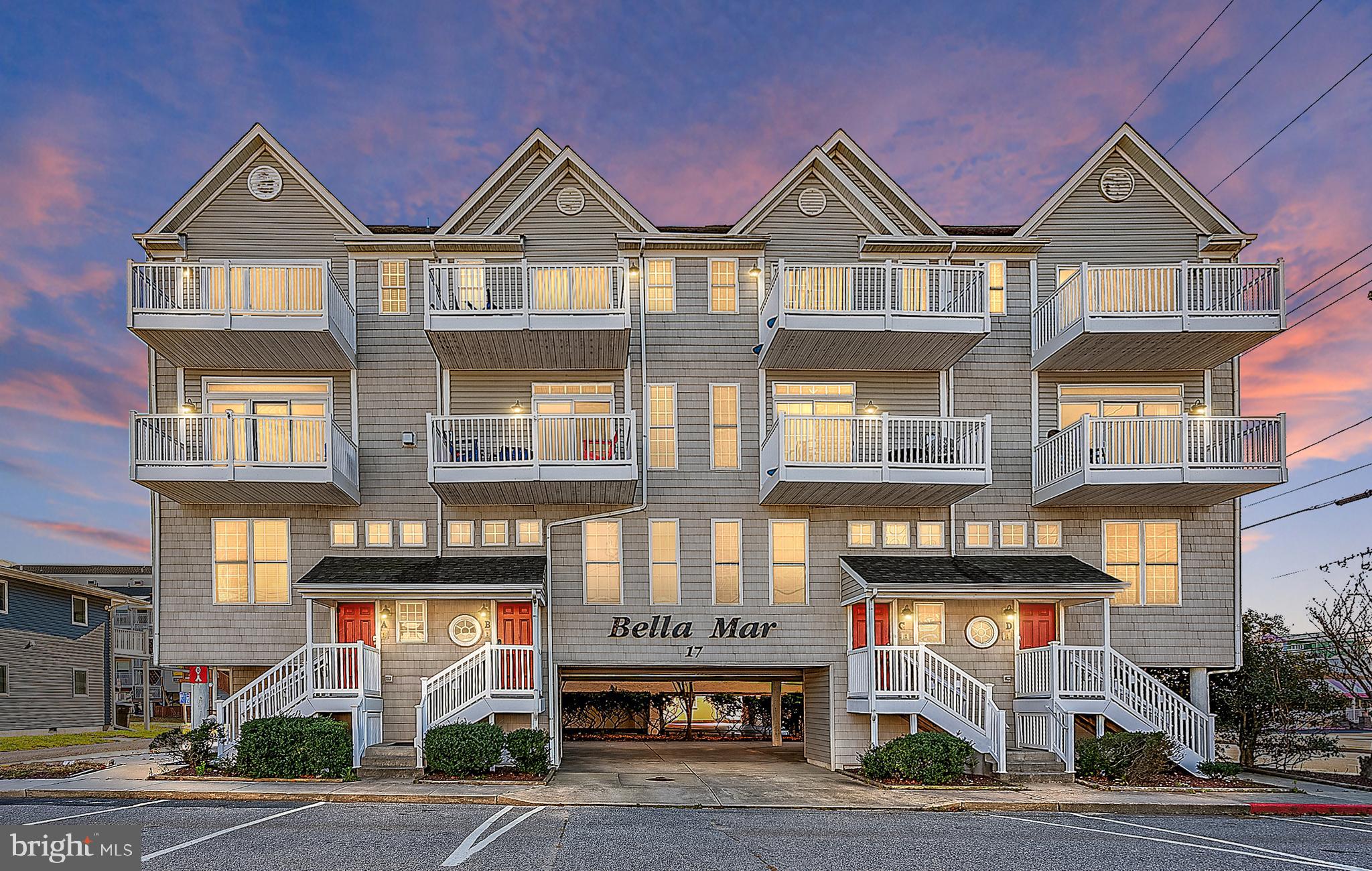 Welcome to this 4-bedroom, 3-bathroom, ocean-block townhouse located in a highly desirable area in Ocean City! This property offers the perfect coastal retreat with a total of five decks on both front and back, allowing you to enjoy sunrises off of the ocean, and sunsets off of the bay. The cozy kitchen flows seamlessly into the dining and living room area, featuring a gas fireplace which creates an inviting space for relaxation and entertaining. With 2 assigned parking spaces, and the convivence of a storage shed underneath. Located on a quiet street, this beach wasn't known to be crowded, which was one of these sellers favorite aspects of this property. This home is within walking distance of popular restaurants, shopping, and entertainment, making it perfect for both personal use and as a fantastic rental opportunity.
