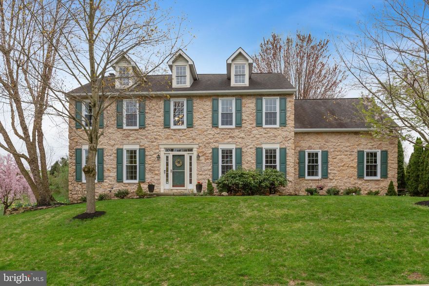 Pride in ownership abounds in this meticulously maintained and perfectly situated two story stone colonial home located in the sought after community of Birmingham Hunt in the top ranked Unionville  Chadds Ford School District. As you approach this stately home, you will notice the mature plantings and beautiful flowering trees. Upon entering the welcoming, bright two story foyer with upgraded light fixture, you will notice the hardwood floors and custom moldings which flow throughout the first floor.Off the entrance foyer you can t miss the convenient first floor office with built-in desk, shelving and storage area. On the opposite side of the entrance foyer, you will find the gorgeous formal dining room with chair rail, wainscoting, crown molding and modern, updated chandelier. The first floor powder room features an upgraded vanity and hardwood floors. The heart of the home is definitely the all new, custom designed gourmet kitchen, which features a 9  granite island, that seats 5. You will be amazed at the loads of storage in the 42  cabinets and the beautiful glass tile backsplash. Stainless steel, Samsung appliances with electric cook range. The beverage center is perfect for entertaining, with the mosaic back splash and built in wine fridge. All the recessed lighting adds to all the natural light that enters the kitchen thru the sliders that open to the large, custom composite deck perfect for summertime relaxing. The open concept kitchen flows into the cozy family room that features a stone, raised hearth gas fireplace with wood mantel, large windows, recessed lighting, ceiling fan and neutral carpet. The convenient, first floor laundry room features built in cabinets for storage and entrance into the two car attached garage. As you ascend the stairs to the second floor, you will notice a large, overlooking landing, which is spacious enough to be used as a sitting area. The large master bedroom features a vaulted ceiling with recessed lighting, ceiling fan and neutral carpet. Spacious his and her closets lead to a sitting area with built in wardrobes and dresser. The bright, spa like master bath features double sinks, large vanity, luxurious soaking tub, spacious shower and linen closet. On the second floor you will also find 3 additional spacious bedrooms and a large hall bath with double sinks. An additional special feature of this home is the finished lower level with an extra finished 860 sq. ft. Walk out to patio. Loads of room in this area for entertaining and game tables. There is also an additional large room that has rubber flooring that is perfect as an exercise room. This room also features built in storage for all your equipment and/or toy storage and a convenient full bath. A storage area with built in shelving leads to the unfinished part of the lower level.This home is move in ready with all new windows, a newer HVAC system and a fenced in back yard. The community has several walking trails and common areas throughout, an annual block party and is located within the Brandywine Battlefield National Historic Landmark and just a stone s throw from Sandy Hollow Heritage Park with its rolling hills and long walking trail. Conveniently located with an easy commute to downtown West Chester, Downingtown, the shopping malls in Exton and Wilmington, the Philadelphia International Airport, Center City Philadelphia, Wilmington. Nothing left for you to do, Simply move in and enjoy!