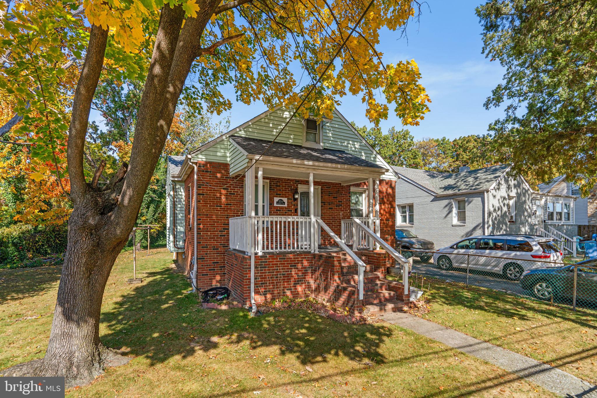 Welcome to 3214 Clarinda Ave — a beautifully maintained home packed with modern upgrades and everyday conveniences. Step into the stylish kitchen featuring black stainless steel appliances and granite counters (2020), perfect for cooking and entertaining. Enjoy peace of mind with a brand-new roof (2025), AC condenser (2022), updated full bath (2021), generator-ready second electrical box (2020), and chimney liner and sump pump added in 2022. Relax outdoors on the charming covered front and back porches overlooking the fenced yard — ideal for morning coffee or summer evenings. The detached garage offers a new roof and insulated door for year-round comfort. Additional perks include a partially finished basement, windows and HVAC replaced in 2010, and a convenient lower-level 1/3 bath. Truly move-in ready and thoughtfully updated throughout!