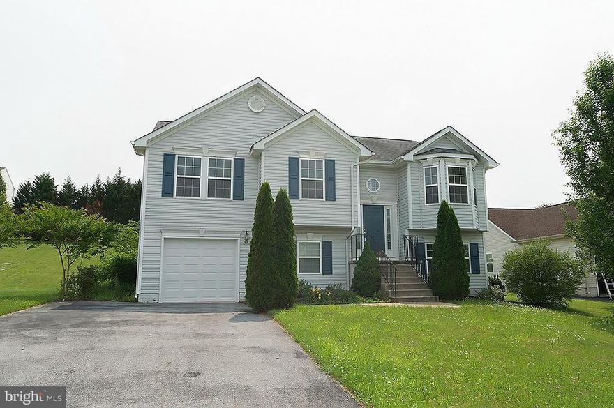 Buyer's Loan Fell Through - Their Loss is Your Gain!  Community Pool, Tennis, Clubhouse on a Cul-de-sac! Large master suite with vaulted ceilings, cozy fp in the living room, sliding doors to the deck. Room in the basement could be home office or bedroom and there is a full bath off the huge recreation room on the lower level. New paint & carpet throughout. Natural gas heat, stove and fireplace.