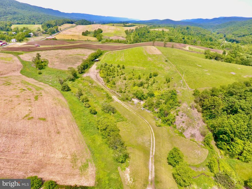 Discover your dream escape on this expansive 6.92-acre parcel, where breathtaking 360-degree mountain views await from one of the highest points overlooking Pinchot Road. This mostly flat terrain offers endless possibilities, complete with electric access for your future plans. Nature enthusiasts will love the frequent deer crossings and diverse birdlife, providing an immersive experience in Pennsylvania's stunning rural landscape. Just a short 15-minute drive to Raystown Lake via Weavers Falls, adventure is always within reach. Don't miss this rare chance to own prime land with unparalleled beauty. Schedule your showing today and prepare to be captivated!