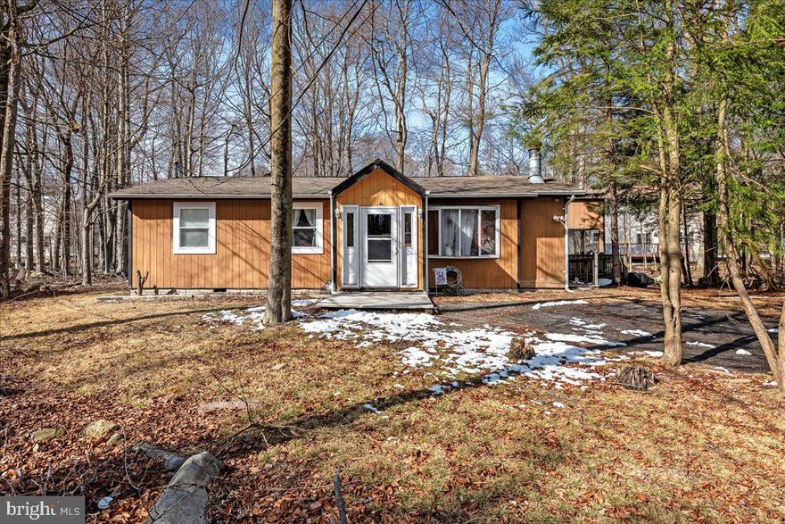 Cozy Ranch Retreat in A Pocono Country Place – Close to Skiing, Lakes & Adventure!
Welcome to your perfect Pocono getaway! This charming 3-bedroom, 1-bath ranch home offers comfort and warmth all year round with its inviting wood-burning fireplace, ideal for chilly mountain nights. Step outside to enjoy a peaceful screened-in porch and a spacious deck—perfect for morning coffee or evening relaxation under the stars.
Tucked away in the amenity-filled community of A Pocono Country Place, and situated at the end of a quiet cul-de-sac, you’ll have access to multiple swimming pools, scenic lakes for fishing and kayaking, playgrounds, and more. Whether you’re seeking a full-time residence, vacation rental or a weekend retreat, this home is just around a 30-minute drive to Camelback Mountain, Jack Frost, and Big Boulder for skiing, snowboarding, and year-round fun.
You’ll also love the proximity to Tobyhanna State Park, where hiking, biking, and outdoor adventures await, along with nearby shopping and dining options to satisfy every craving.
Whether you’re looking for your next vacation home or a peaceful place to settle in, this cozy ranch is the perfect place to call home.