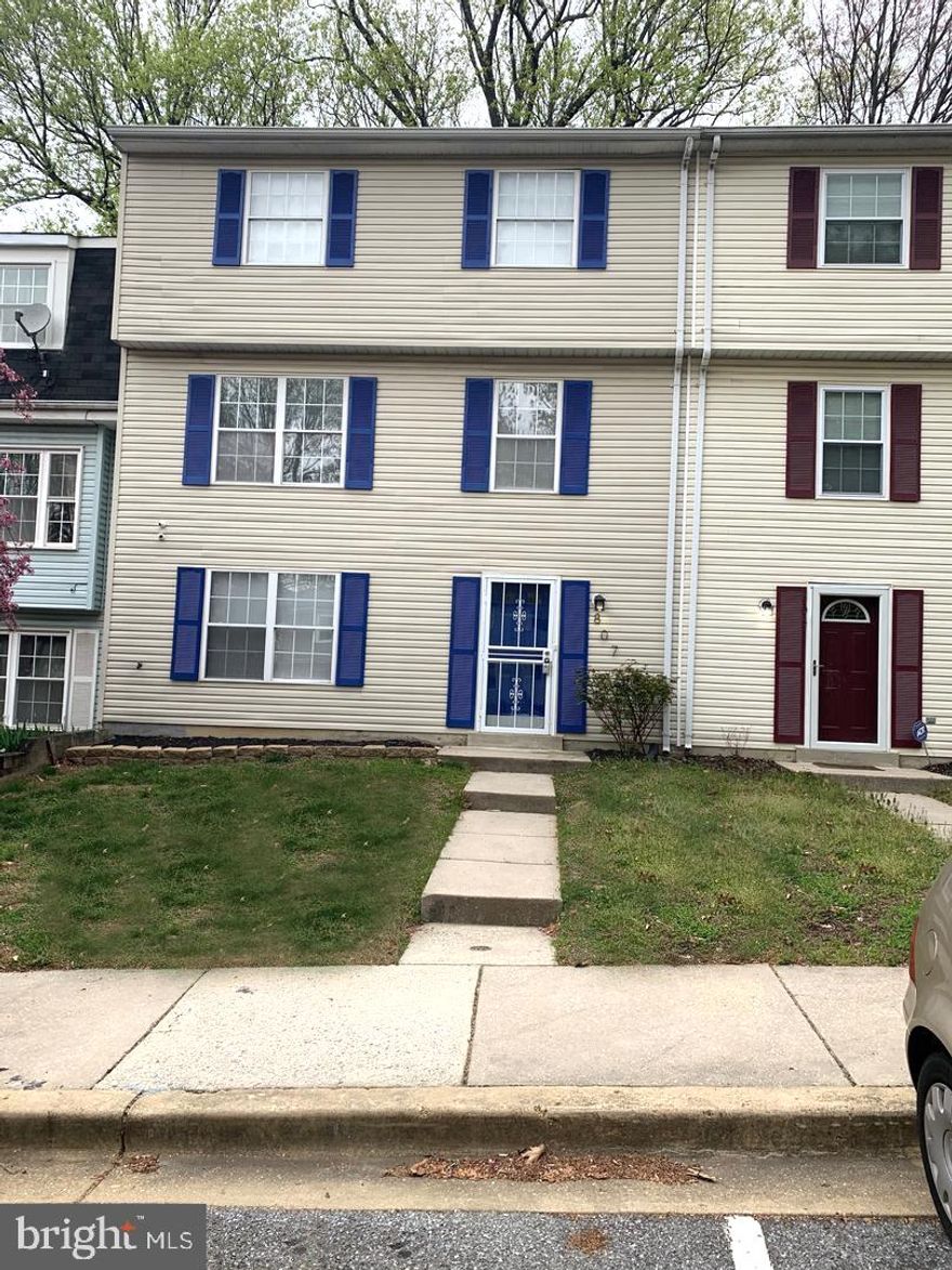 Spacious townhouse within close proximity to major routes, easily accessible to public transportation, the beltway and shopping. The main level of this property features a spacious rec area with a half bath and plenty of storage space, The upper level features an eat-in kitchen, spacious family room and another half bath, the third level features 3 bed rooms including a spacious primary bedroom and a full bath. The backyard is fenced in for added privacy and security. There are two assigned parking spaces and one is directly in front of the house.