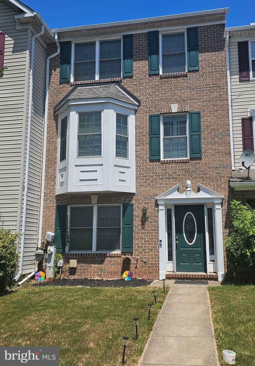 Great Brick-Front, Three-story Townhome in Deerborne with NO HOA or Condo Fees! Features 4 Bedrooms and 2.5 Bathrooms throughout three finished levels! GROUND/WALK-IN/LOWER LEVEL features: Laminate/Vinyl in big Family Room, Full Bath w/shower and stacked Washer and Dryer, Double slide door leads to back yard and common areas.  MAIN LEVEL features:  Living Room or use as Living Dining Combo with Hardwood floors, Kitchen with Breakfast area and Double slide door leads to Deck (Deck has stairs that lead down to backyard), and Half Bathroom. UPPER LEVEL features: 3 Bedrooms with carpet, 1 Full Bath with jacuzzi soaking tub and New separate Shower. Updated features: Windows throughout (2023), Sliding doors on first and second floors (2023), HVAC system (2023), Roof is 5yrs old, and Shed. This home is convenient to restaurants, shopping, markets, and quick access major roads and highways.