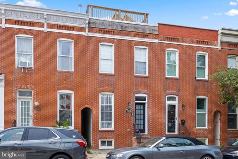 Photo of 109 Fort Avenue W, BALTIMORE, MD 21230 (MLS # MDBA2215930)
