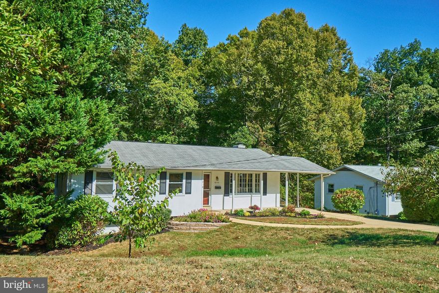 OPEN SAT, 2/29, 1-4pm and SUN, 3/1, 1-4pm!  Fabulous single family home in the heart of Springfield!  Model perfect and move in ready.  Hardwoods on main level, with open floorplan and loads of windows and light.  Separate living and dining areas, adjacent to spacious, fully remodeled kitchen.  Huge deck off of kitchen overlooks large, level backyard backing to woods.  Three  bedrooms and remodeled full bath on main level.  Lower level offers large rec room with lovely brick fireplace, separate office, large legal bedroom, remodeled full bath, separate laundry room, and walk out to patio.  Fabulous commuter location -  close to 395/95/495, Springfield Metro, and more!  West Springfield pyramid.