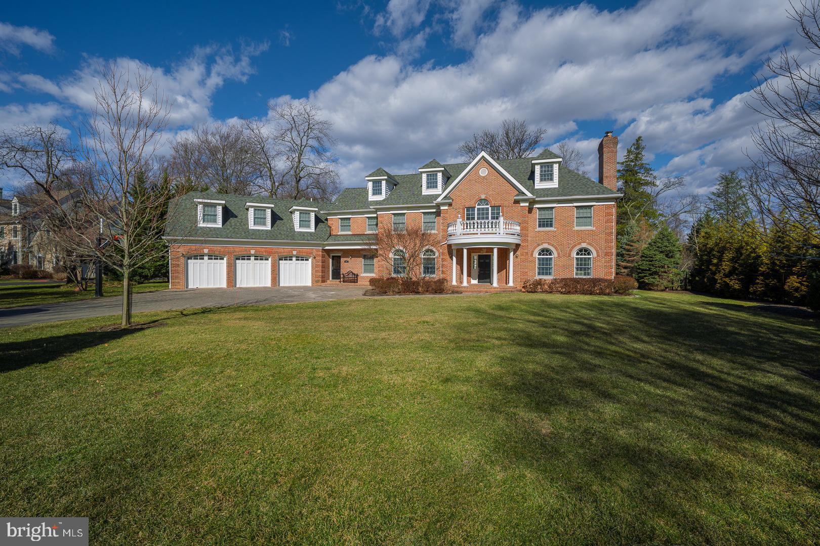 Stunning brick estate located on a private lane with only 2 other homes in the heart of Penn Valley. This entirely brick built custom home is set on almost 1 level acre of tranquility and has been beautifully redesigned inside and out. From the paver driveway to the beautiful interiors nothing has been overlooked. As you enter the two story foyer which is bathed in light you will be greeted by a sweeping formal staircase. The formal living room with fireplace and dining room flank the stunning foyer. A first floor office offers beautiful rear yard views and the renovated spacious eat in kitchen provides a beautiful space to entertain with quartz countertops, island seating, a breakfast bar, back staircase and an organization area. The family room features a soaring ceiling, two story stone fireplace, a transitional custom built in for your entertainment area and a wall of windows to view the outdoor space. Upstairs find the grand primary suite with a tray ceiling, walk in closet, gas fireplace and marble primary bath with a walk in shower, dual sinks and a jacuzzi tub. Two additional bedrooms have en suite baths and the final 2 bedrooms share a jack and jill bath with shower/tub. The finished basement offers additional space for a second office or playroom. Outdoors find a custom paver patio with space to dine or simply relax while overseeing your private expansive grounds. Meticulously maintained by the current owners- new hot water heater, 2 new hvac units, generator, a 3 car garage and in Lower Merion School District. This beautiful estate is ideally located within minutes to downtown Gladwyne and an easy commute to Center City.