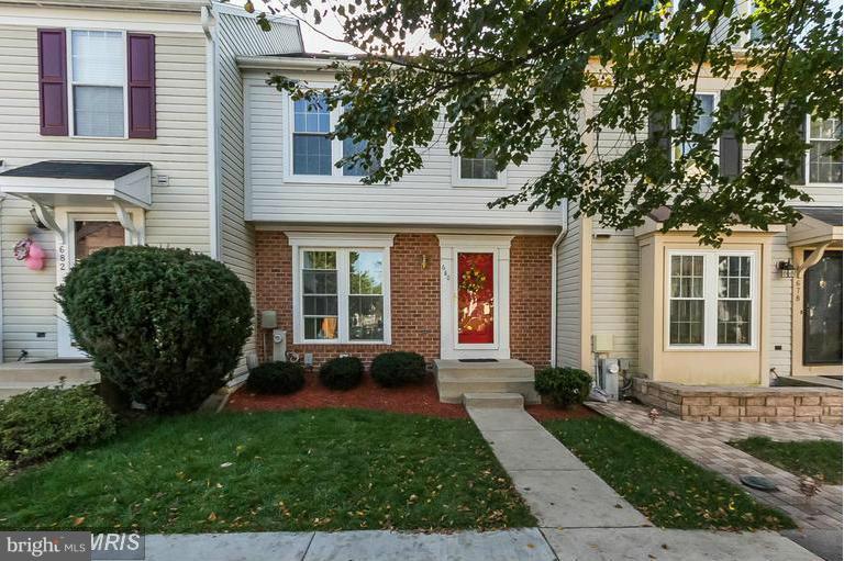 WOW! Just stunning. Gleaming hardwood floors, updated kitchen , freshly painted throughout the entire home. Recently remodeled basement with pool table. Enjoy nights by the wood burning fireplace.