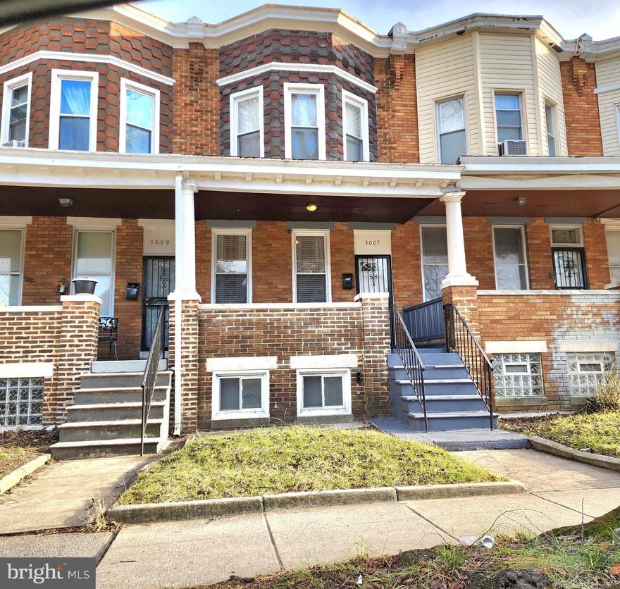 Do not miss the opportunity to check out this fully updated home for less than 200k.  New rubber roof, new HVAC, new flooring throughout, new water heater.  The basement is finished and has a 4th bedroom in it as well as a full bath, and a separate entrance from the backyard. There are 3 bedrooms and an additional full bath on the upper level.  The main level has an updated kitchen and a large family/dining room combo. There is plenty of parking on the street as well as a parking pad in the back of the home. If you enjoy sitting outside, there is a large front porch area as well as a balcony off of one of the secondary bedrooms on the upper level. No ground rent as it was previously bought out.  Tax record does not reflect accurate lot size. This is a great opportunity for an investor to purchase and immediately rent out OR for anyone to enjoy a home that has all of the updates already done for you.  MOVE IN READY! Enjoy the convenience of bus stops, and 2 shopping centers within walking distance.  Your front porch looks out to acres of parkland.