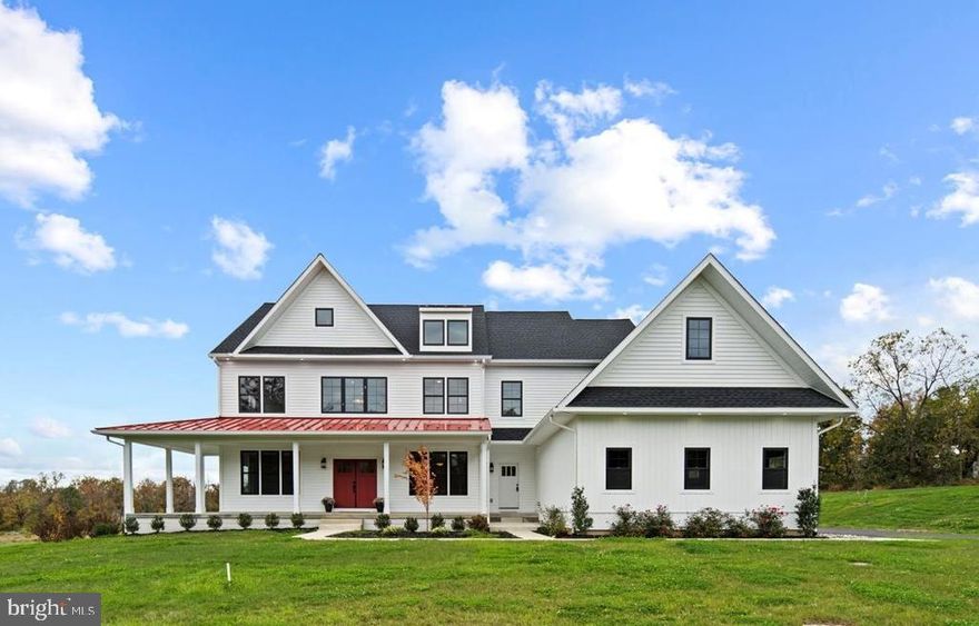 5.9% BUILDER FINANCING! LAST ONE REMAINING! This beautiful 5 bedroom, 4.5 bath modern farmhouse with wrap-around porch is COMPLETED and available IMMEDIATELY!  The home is loaded with luxury standard features and appointments built by an experienced team of professionals committed to superior craftsmanship. With an astute attention to detail utilizing only quality materials befitting of luxury living, Corsini Custom Homes pride themselves on delivering a beautiful product for today’s modern lifestyles. The flexible open floor plan includes dramatic 9’ ceilings throughout the house and custom millwork. Beautiful hardwood flooring graces the first floor, double staircases and second floor hallway. When you walk in the front door to the two-story open foyer, to the left is the first-floor owners suite with en suite bath that can be used as an office. To the right is the lovely dining room that includes crown molding and board and batten millwork. The custom gourmet kitchen boasts built-in furniture quality kitchen cabinets featuring adjustable shelves and soft-close drawers. The oversized island with quartz countertops features an overhanging breakfast bar for seating. The kitchen features high end appliances including a 6-burner stainless gas range, built in microwave, double wall oven and a stainless refrigerator. A wood burning fireplace warms the family room. The second-floor features two adjacent bedrooms that share a Jack and Jill bathroom. Walk down the hall to the third bedroom with an en suite bath. The primary bedroom rounds out the second floor and includes a dramatic and beautiful bathroom with soaking tub, super shower and two water closets. In addition, there are two primary walk-in closets, a quiet sitting room and multiple areas for storage off the primary bedroom. The 3-car side entry epoxied garage is pre-wired for an Electric Vehicle charging station. In addition, the house it is pre-wired for a generator, security & alarm systems, cable & internet. The basement includes recessed lighting and plumbing rough-in for Buyers to finish a full bath one day if they choose. The home has PUBLIC sewer, private water, and NO homeowner’s association. It is conveniently located near 611 and in the award-winning Central Bucks School District. Call the listing agent to schedule a private tour.
**Builder financing  and interest rate for those who qualify and is with the use of County Mortgage Services LLC.  **
