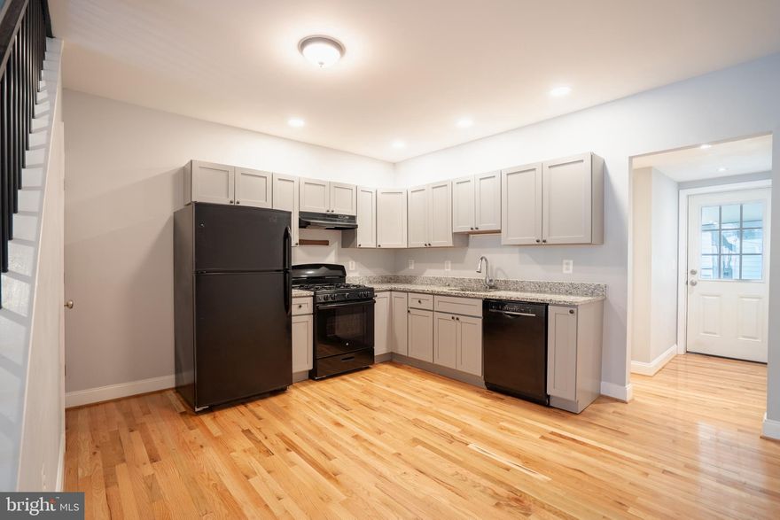 Completely renovated in 2020, this beautifully updated home has a lot to offer in the heart of Hampden. The property features stunning hardwood floors throughout, updated appliances, and a thoughtful renovation that blends modern finishes with classic Baltimore charm. The property is zoned for both residential and commercial use. Great updates that include a New Roof in (2020), (2020) Water Heater and a (2020) HVAC. Located in the heart of Hamden, you are just steps from the best this neighborhood has to offer. Enjoy easy walking distance to popular restaurants, local boutiques, coffee shops, and neighborhood favorites. This location offers true walkability and convenience for buyers seeking an active city lifestyle. The fully fenced backyard provides private outdoor space perfect for entertaining, relaxing, gardening, or pets. A rare find in this location, it adds valuable functional outdoor living space. Ideal for buyers looking for turn key condition and vibrant city living in one of Baltimore’s most sought-after neighborhoods!