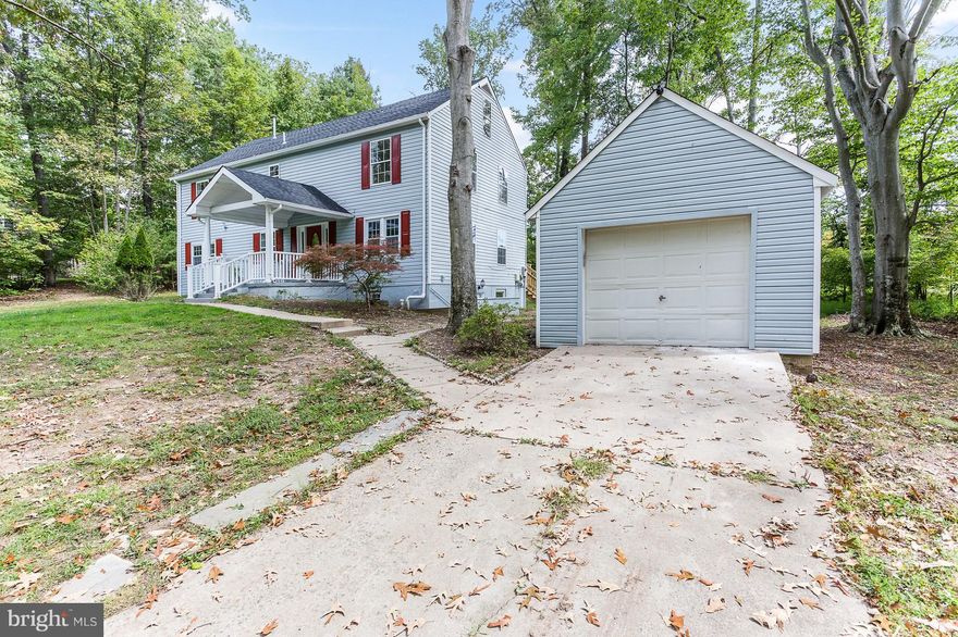 THIS ONE IS A MUST SEE!!!  THREE LEVEL HOME FULLY RENOVATED FROM TOP TO BOTTOM, NEW GRANITE TOP, NEW CABINETS, STAINLESS STEEL APPLIANCES, NEW WASHER AND DRYER, FULLY FINISHED BASEMENT, ONE CAR GARAGE, LARGE DECK,  BACK TO TREES, GOOD PRIVACY ON 1 ACRES LOT CLOSE TO QUANTICO AND PUBLIC TRANSPORTATION.