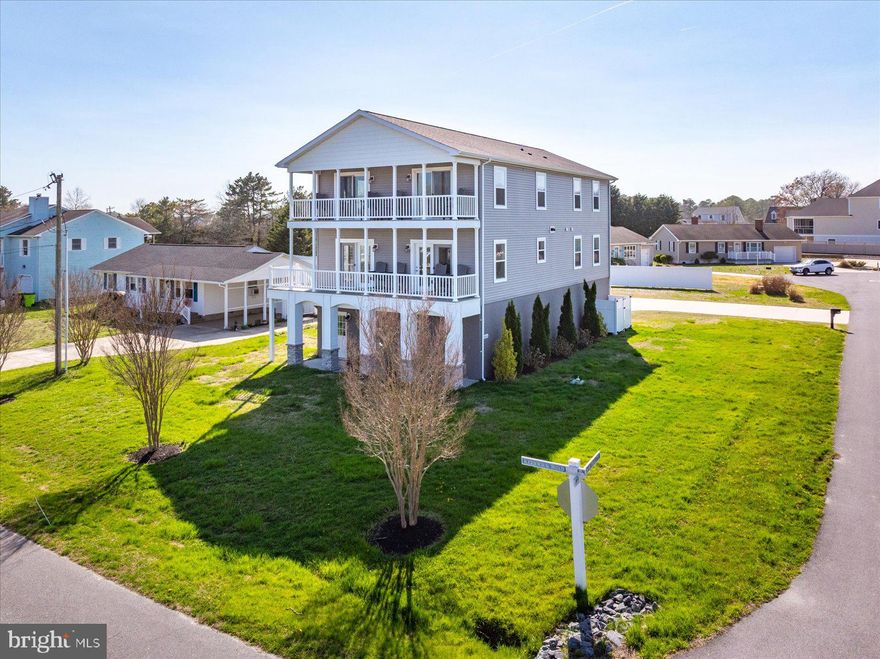 Just 2.5 miles to the beach, this fully furnished, move-in-ready 6-bedroom, 4.5 bath home in Keen Wik on the Bay offers exceptional space, comfort, and coastal living. Set on an oversized lot with a large driveway, the property provides generous parking along with a 2‑car garage and extensive additional storage space, ideal for beach gear, tools, or hobbies. A private elevator services all levels for added comfort and accessibility. The home has been recently professionally painted. The main level features a bright, open layout with a spacious kitchen, recently upgraded sink and faucet, stainless steel appliances, and a large island perfect for gatherings. The living room offers great natural light and plenty of space for the family to relax and enjoy time together. This floor also includes a hallway bath, a primary suite with a full bath, and an additional bedroom. LVP flooring runs throughout the main living areas, with carpeted bedrooms for comfort. The second floor includes a second primary bedroom with an en suite bath, plus three additional bedrooms and 2 full baths—ideal for hosting family and guests. Spacious decks extend right from the dining room and kitchen, as well as from two upstairs bedrooms, providing inviting outdoor areas to enjoy sunrises, breezes, and the coastal atmosphere. Keen Wik on the Bay offers an incredibly low $55/year HOA, walkability to nearby restaurants and shops, and close proximity to a public boat ramp, making it a perfect location for beach lovers and boaters. Situated just across from the canal, the home captures a lovely glimpse of the water, adding to its coastal appeal. 
A great opportunity to own a fully furnished, move‑in‑ready home just minutes from Fenwick Island.