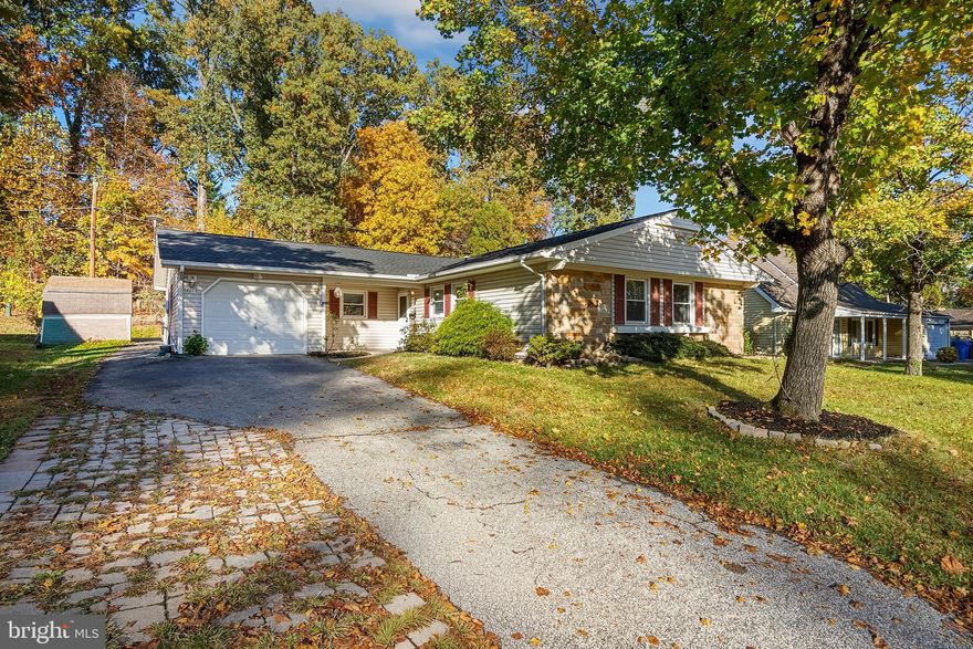 Set on a quiet street in the highly desired Whitehall neighborhood, this home offers true single-level living and a large rear addition that gives you plenty of space. The entry feels open and inviting thanks to a reconfigured foyer with a relocated coat closet that clears the sightline as soon as you walk in. The kitchen now opens to the living area after removing the dividing wall and adding a long granite counter that works for serving and casual seating, and the kitchen is upgraded with the modern conveniences you want. The great room rises under vaulted ceilings and centers on a fireplace with a real brick feature wall and a slate raised hearth that runs the length of the room, perfect for game nights, movie marathons, or a quiet morning coffee. Outside, the backyard is beautifully terraced with a porch and sitting area for relaxed hangouts or easy weeknight dinners, and the setting is private with no direct views from neighbors. Every day life is simple here. Coveted Whitehall Elementary School is only seven houses away, with sidewalks the entire way so kids can safely walk back and forth in under five minutes. The home offers four bedrooms, including the three original bedrooms plus a fourth created in the garage, all on one comfortable level.

Bowie is a wonderful, vibrant, and proudly diverse community boasting an incredible array of amenities including numerous private pools, two gorgeous libraries, a performing arts center, a playhouse, a public splash park, a hockey rink, a skate park, a bike park, a dog park, Allen Pond, White Marsh Park, Liberty Sports Park, an eighteen-hole golf course, our own police, our own minor-league baseball team with its beautiful stadium, and ample programs for our senior citizens. If you have any questions whatsoever, give my group a call or ask your realtor to contact us, and we will get the answers to you right away. We would be delighted to help you make this exceptional property your own.
