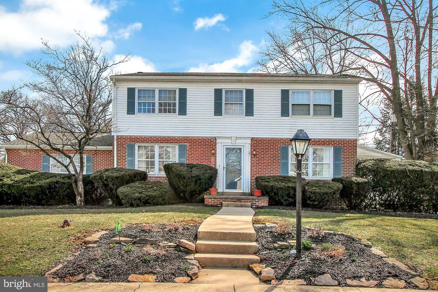 You must see this stately 2-story colonial located on a large corner lot in Wilson School District!  This home has plenty of space with 2,016 square feet, 4 bedrooms, 2.5 baths, a formal dining room, living room, family room, and pretty vaulted ceiling sunroom. You will love the wood-burning brick fireplace and plantation shutters in the family room, the stainless steel appliances in the kitchen, and the hardwood floors just waiting to be uncovered on both floors.  Other great features include the backyard deck, side entry 2-car garage, central air, economical gas heat and newer heating system (2009), and the new roof that was installed by Bachman's in 2014. One year HMS Home Warranty included. So call today for your private showing, you will not be disappointed!