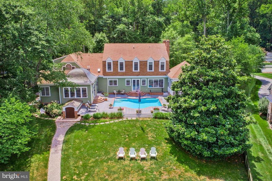 Luxurious waterfront estate on Whitehall Creek with 126  of water frontage, 8 feet MLW, a pier and two slips.  This home was built in 2005 with the finest materials and craftsmanship. The main level of the home features ten foot ceilings, heart of pine flooring, curved doorways, two wood burning fireplaces, and many fine architectural details and moldings. The heart of this home is the expansive gourmet kitchen that opens to the great room with views of the waterside pool and creek. A huge screened porch with tray ceiling, spacious formal living and dining rooms, and a sumptuous main level master suite round out the main level.Upstairs there are four additional bedrooms with Jack-and-Jill style baths, one of the bedrooms has built-ins and can be used as a waterside study/office. A two bedroom apartment is located above the three car garage, complete with a parking pad and separate entrance. The lower level offers a spacious recreation room, exercise room, another room that can be used as a bedroom with a full bath, and a spacious workroom/storage room with stair access to the rear yard.This home is perfect for entertaining and making memories with family and friends. The oversized rooms and outside spaces have a wonderful flow. For a discerning buyer this home could not be replicated at nearly the price it is being offered. Close to major commuter routes and minutes from historic downtown Annapolis. Come, See, Stay a Lifetime.