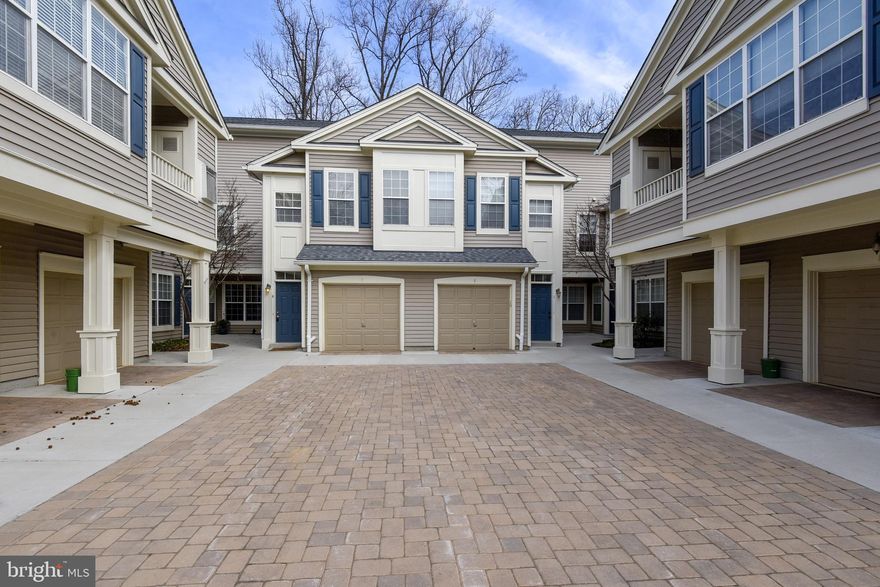 Newly remodeled! Bright & Light with Open Floor plan. Most sought after Model, 2 bedroom, 2 bath , 3 level condo with attached garage . Drive in to your 1 car garage and step into your foyer. Open floor plan,  Hardwood floors on main level, Freshly Painted, Recessed lighting, New Stainless Appliances. Gas Fireplace in Family Room. Balcony faces trees. Bathroom updates! Tile floors in both Bathrooms.Shows beautifully.