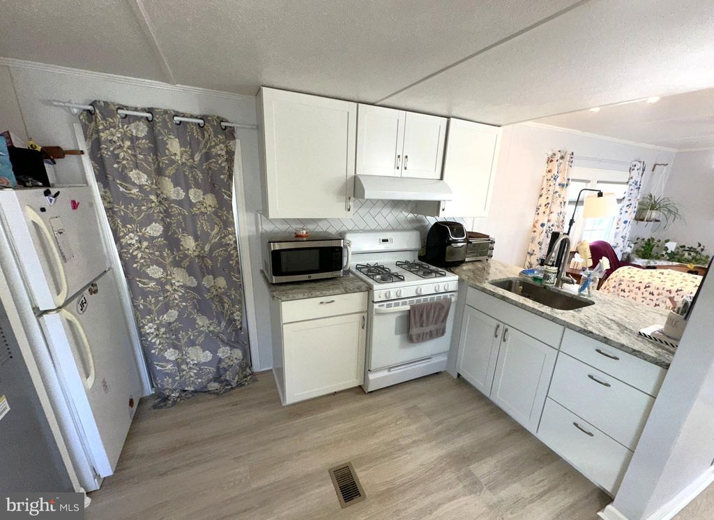 Photo of 8049 Veterans Highway #TRLR 52, MILLERSVILLE, MD 21108 (MLS # MDAA2113410)