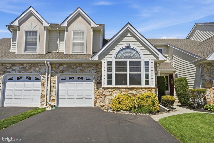 Welcome to this stunning home in the highly desirable Ivygreene subdivision,.  Perfectly situated on one of the most private premium lots in the community. This beautifully maintained property offers both elegance and comfort.  Step into the dramatic two-story foyer featuring a convenient powder room.  The main level also a versatile office or den with palladium window.  There is a full laundry room  that provides direct access to the garage.  The heart of the home is the gorgeous kitchen complete with 42 inch maple cabinetry,
granite countertops with ceramic tile backsplash.  Upgraded Samsung stainless  refrigerator, stove and built in dishwasher and microwave.  The open concept living room and dining room areas boast vaulted ceilings, rich hardwood flooring, and an abundance of natural light, new skylights all creating a a warm inviting atmosphere.  Step out onto the back deck and enjoy peaceful, private views of the surrounding greenery.  The primary suite is a true retreat, , featuring hardwood flooring, cathedral ceilings, and ample natural light. It also includes a spacious walk-in closet with an addition closet.  The en-suite bath offers a stall shower, upgraded vanity and ceramic tile flooring.   Stylish staircase leads to an open loft area- ideal for living space, office or reading nook.  There is a large walk-in closet with all custom shelving.  A full bathroom with ceramic tile flooring and shower and custom vanity.    The second bedroom features hardwood flooring, large closet. This completes the second floor.  The full unfinished basement offers endless possibilities.  Whether you envision a home theater, gym or additional living space.  This exceptional home combines thoughtful  design and quality updates.   Prime location close to shopping, restaurants .   This home shows true pride of ownership.